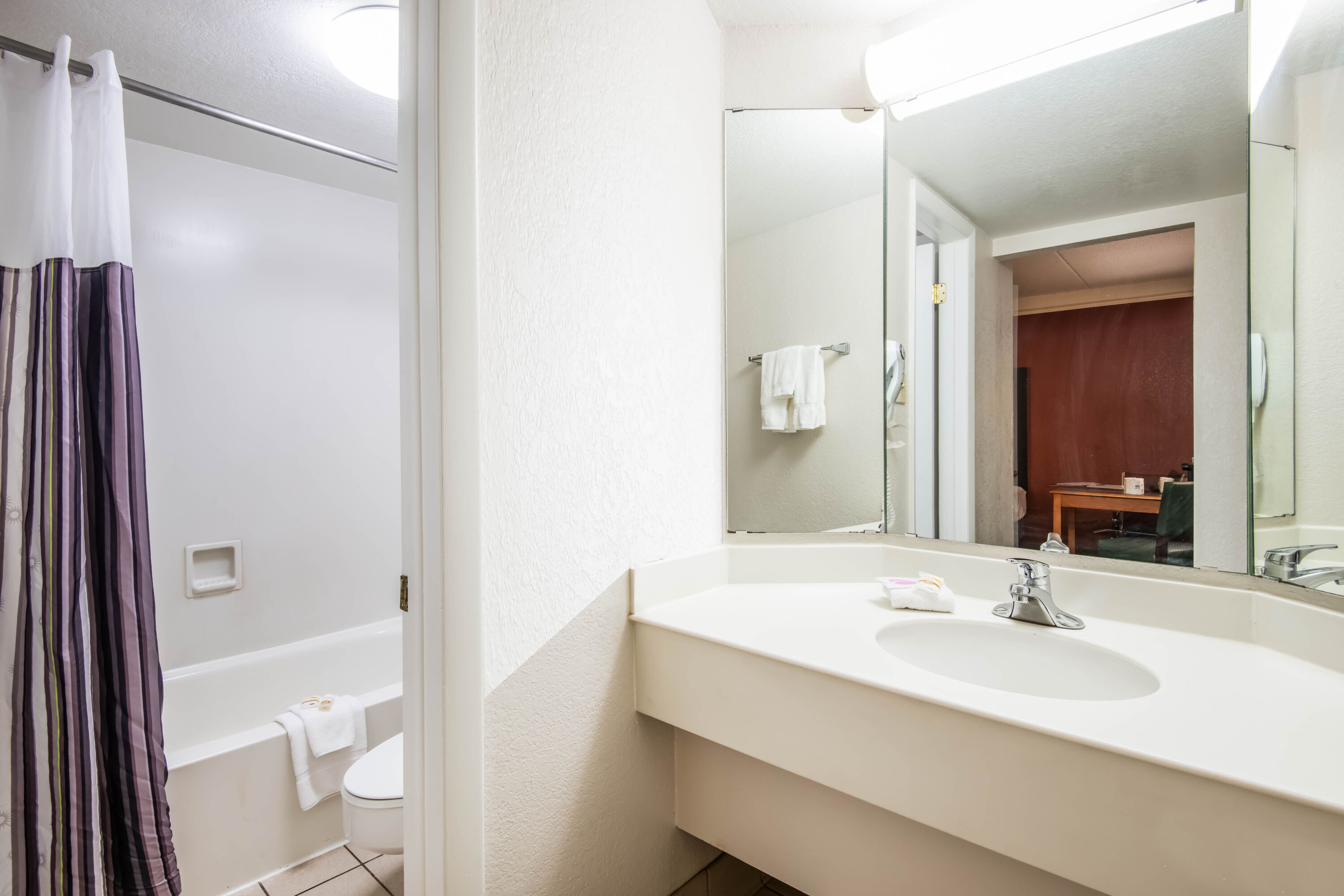 Guest room bath at the La Quinta Inn by Wyndham Colorado Springs Garden of the Gods in Colorado Springs, Colorado
