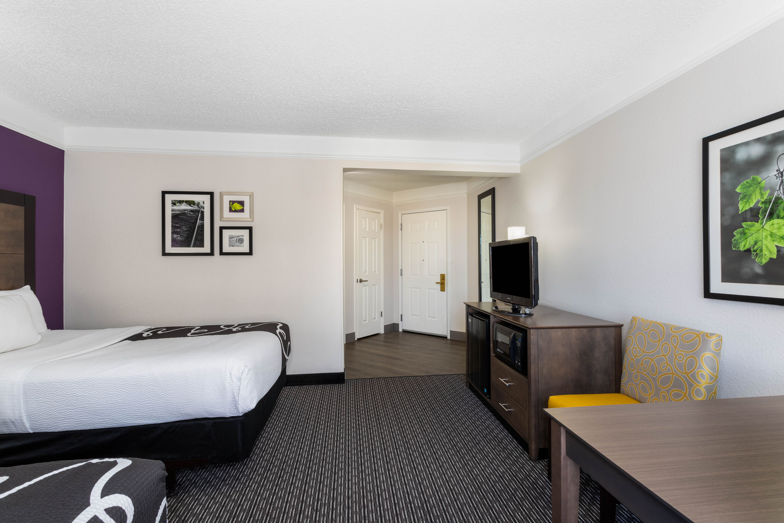 Guest room at the La Quinta Inn & Suites by Wyndham Denver Boulder-Louisville in Louisville, Colorado