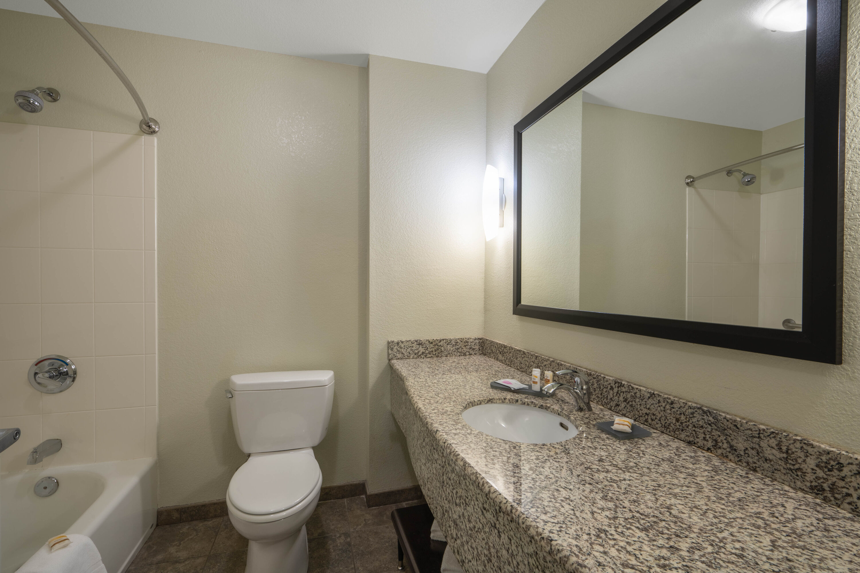 Guest room bath at the La Quinta Inn & Suites by Wyndham Loveland/Estes Park in Loveland, Colorado