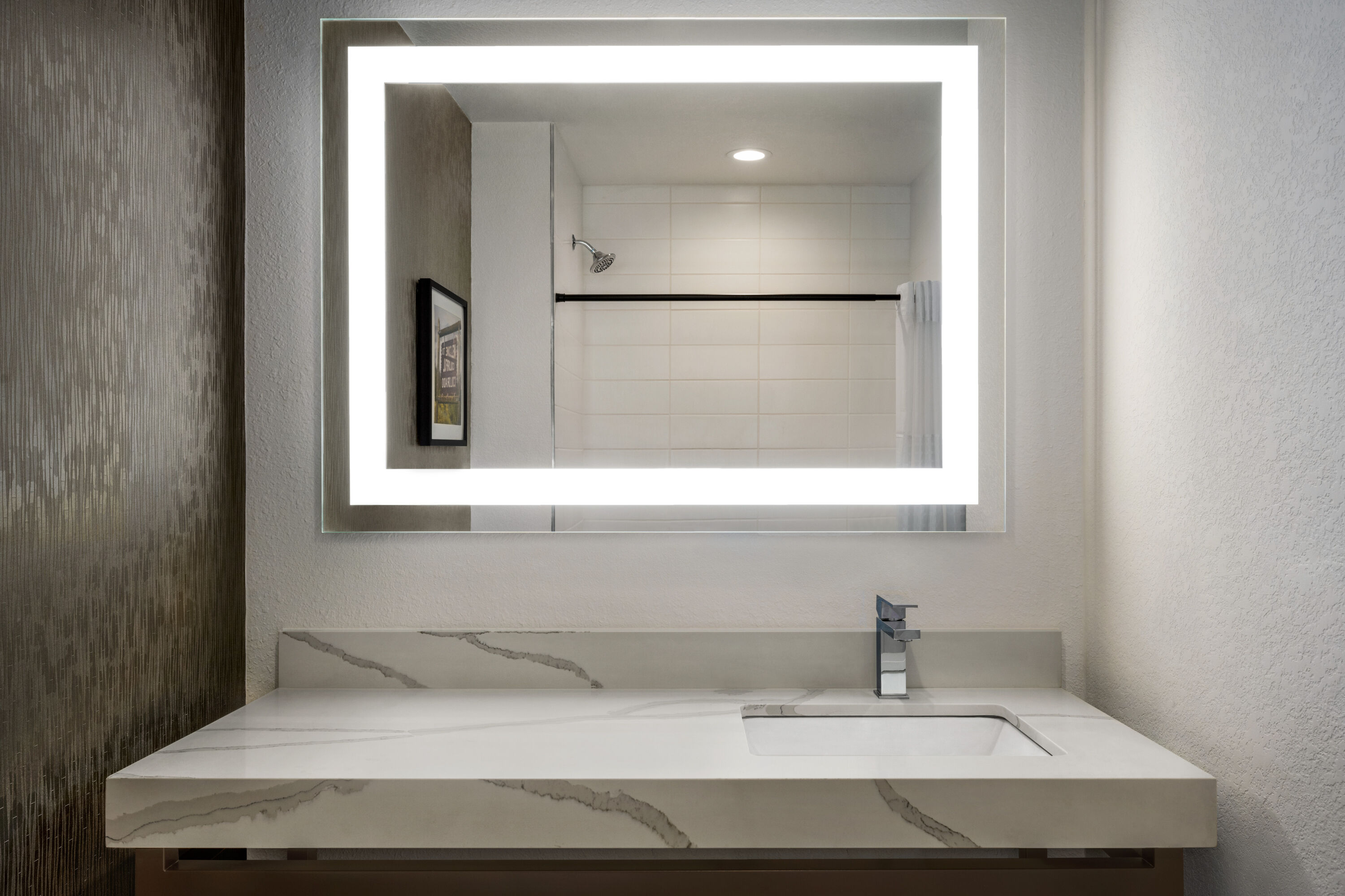 Guest room bath at the La Quinta Inn & Suites by Wyndham Denver Parker in Parker, Colorado