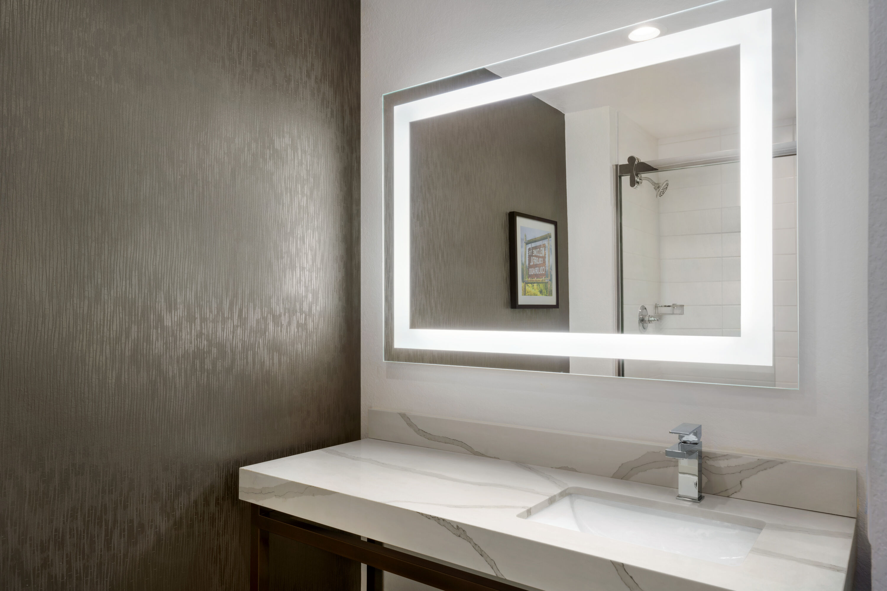Guest room bath at the La Quinta Inn & Suites by Wyndham Denver Parker in Parker, Colorado