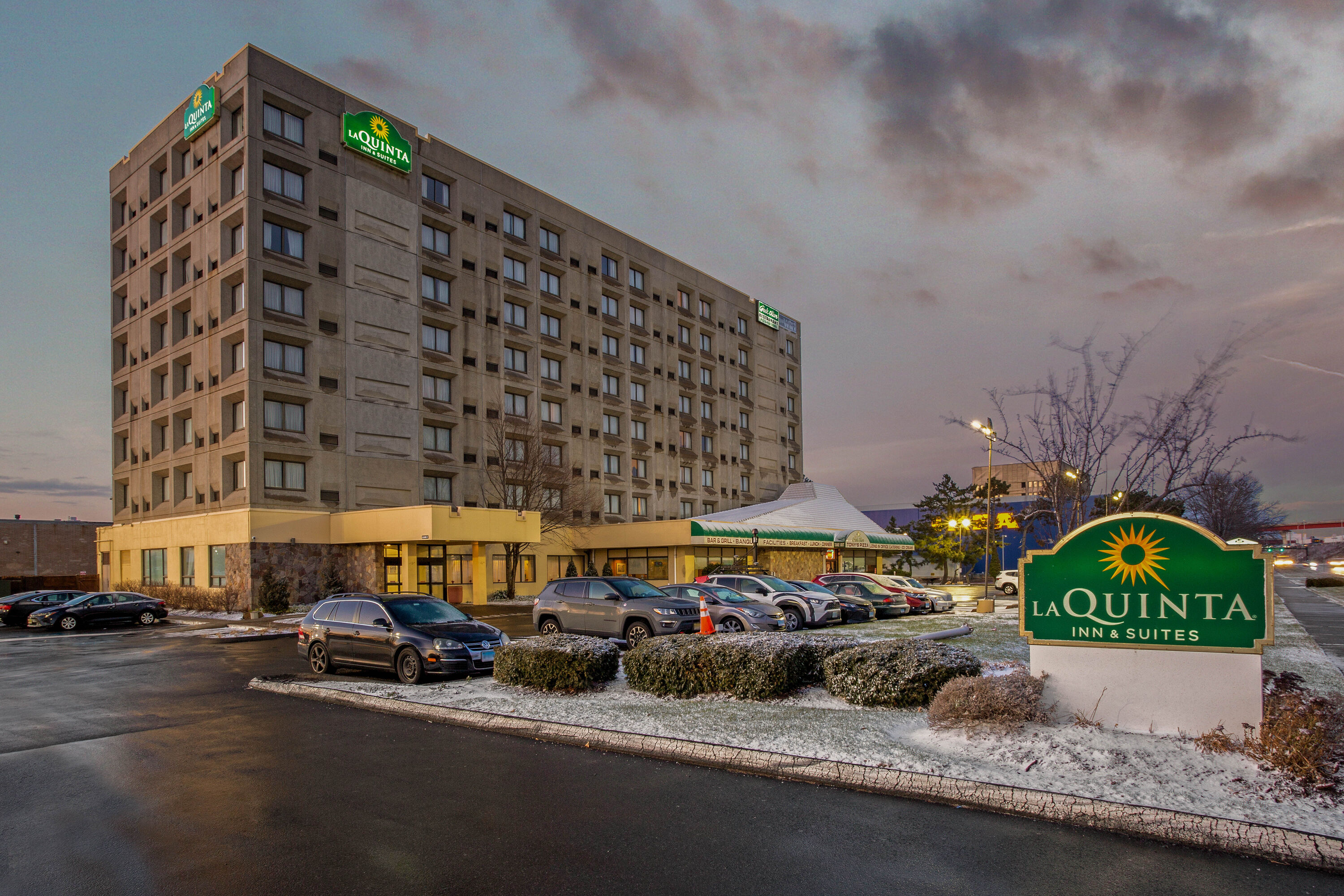 Exterior Dusk Image of La Quinta Inn & Suites by Wyndham New Haven hotel in New Haven, Connecticut