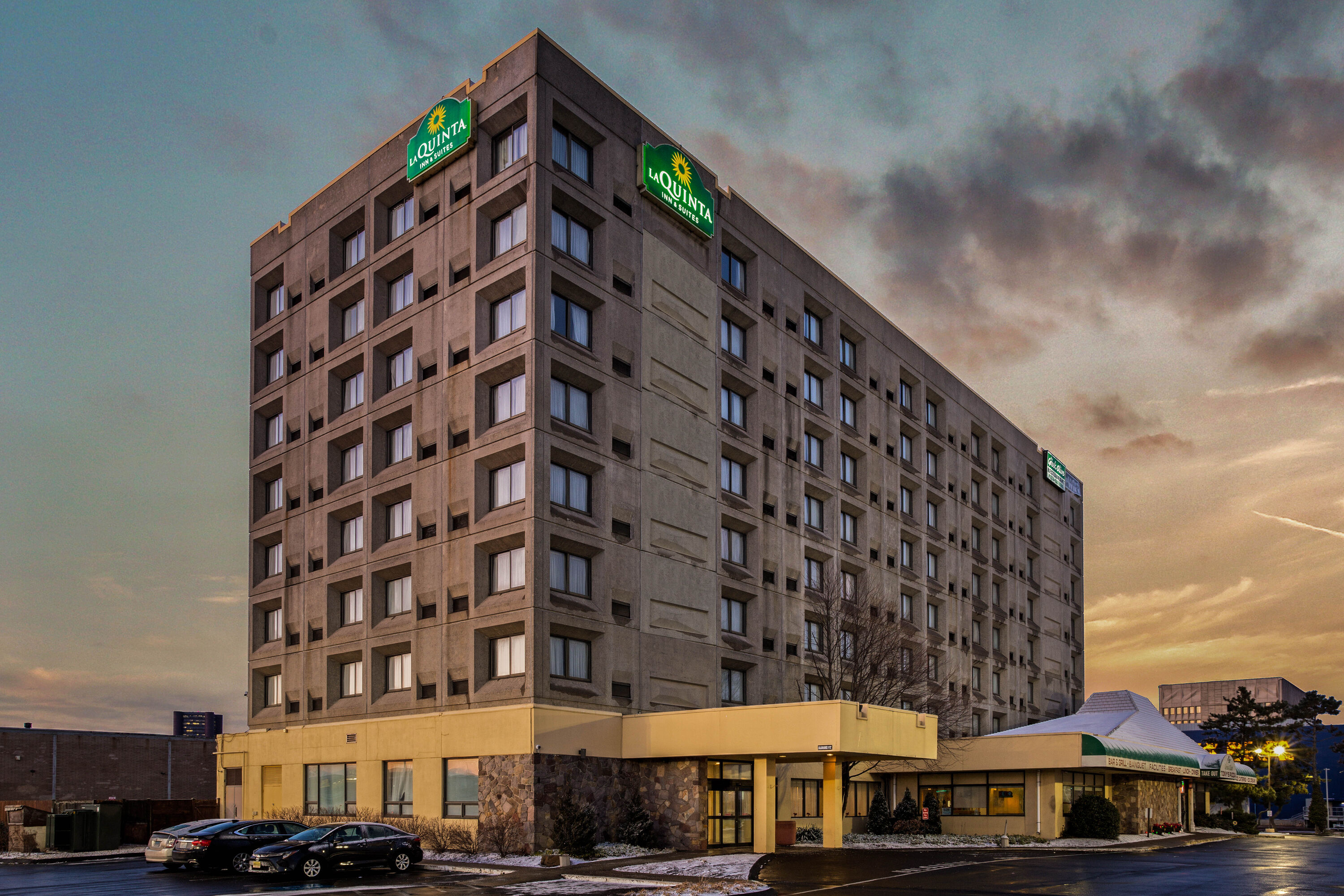 Exterior Dusk Image of La Quinta Inn & Suites by Wyndham New Haven hotel in New Haven, Connecticut