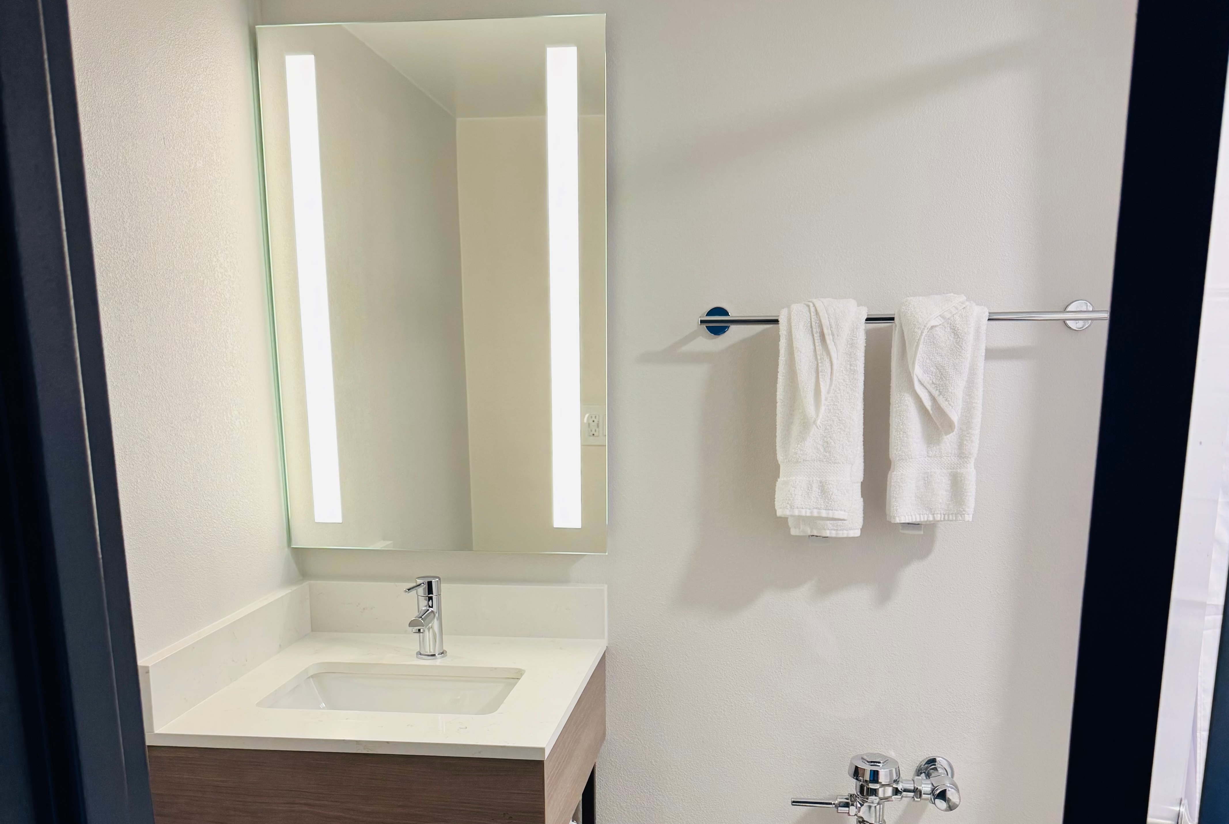 Guest room bath at the La Quinta Inn & Suites by Wyndham New Haven in New Haven, Connecticut