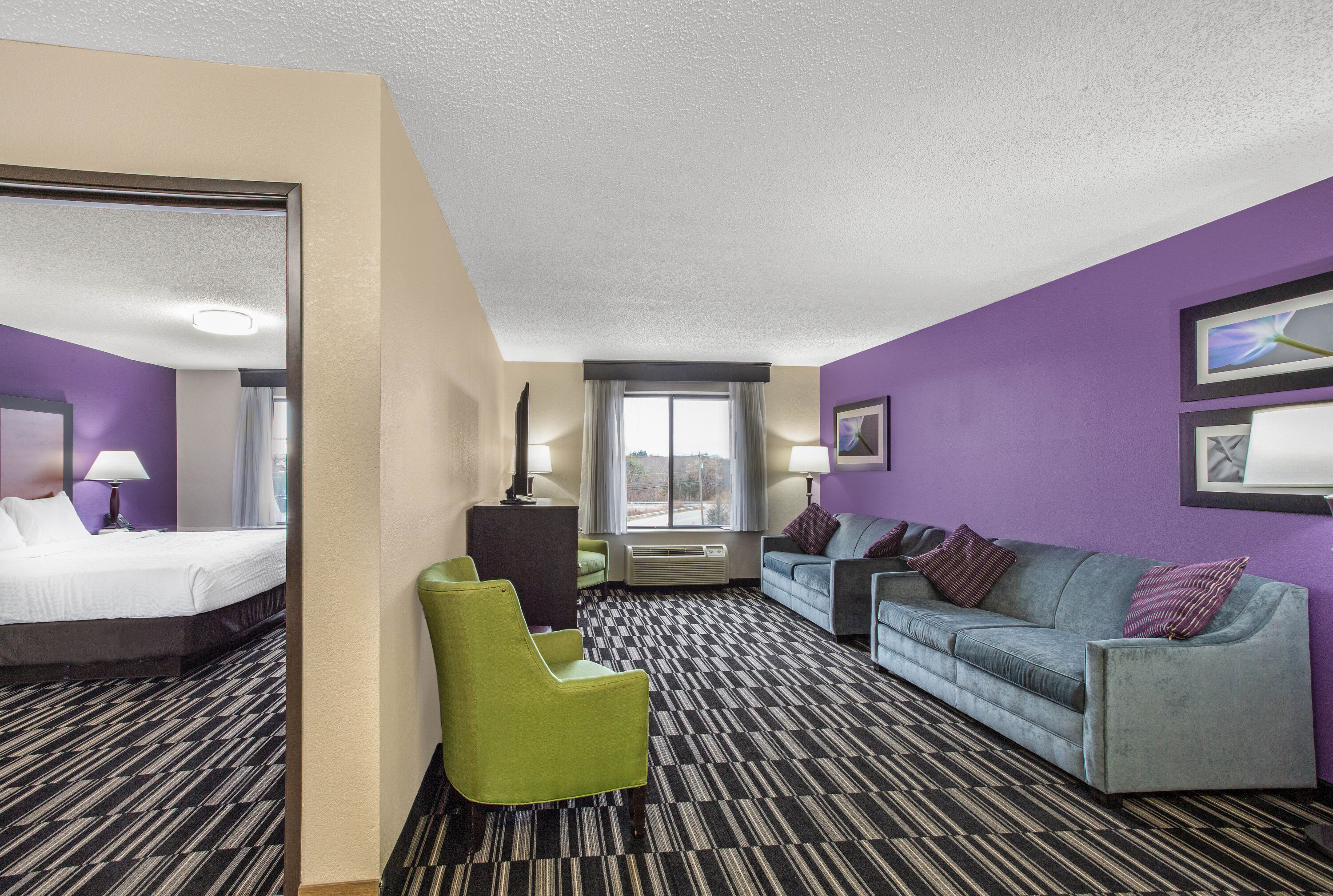 Guest room at the La Quinta Inn & Suites by Wyndham Norwich-Plainfield-Casino in Plainfield, Connecticut