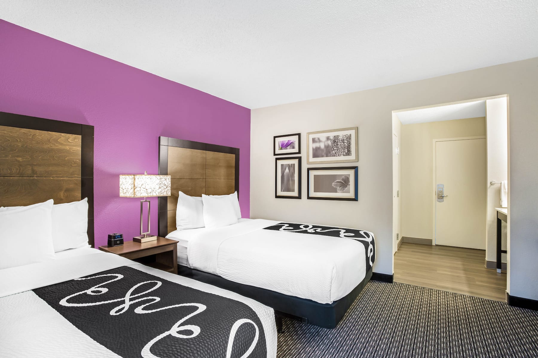 Guest room at the La Quinta Inn & Suites by Wyndham Hartford - Bradley Airport in Windsor Locks, Connecticut