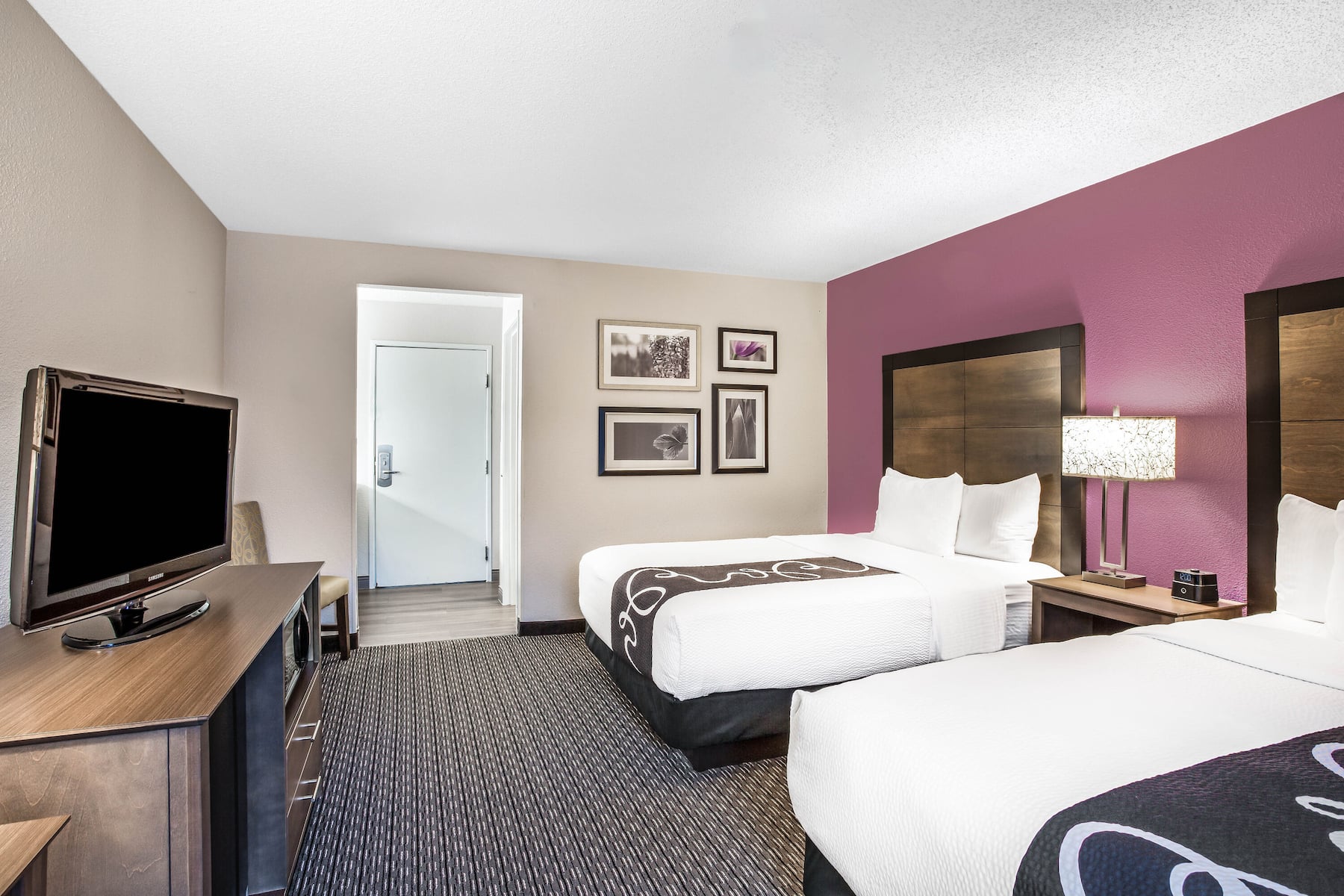 Guest room at the La Quinta Inn & Suites by Wyndham Hartford - Bradley Airport in Windsor Locks, Connecticut