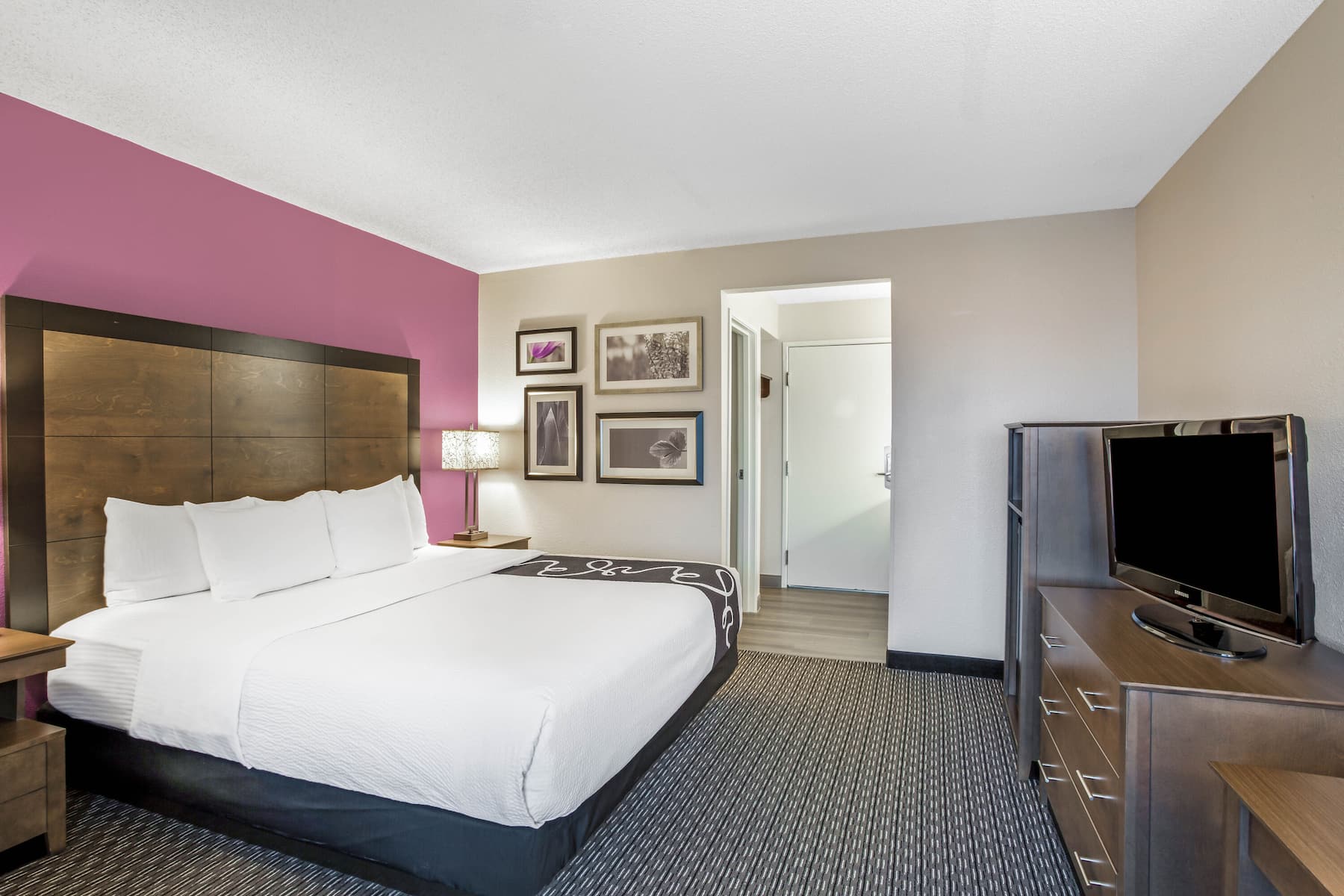 Guest room at the La Quinta Inn & Suites by Wyndham Hartford - Bradley Airport in Windsor Locks, Connecticut
