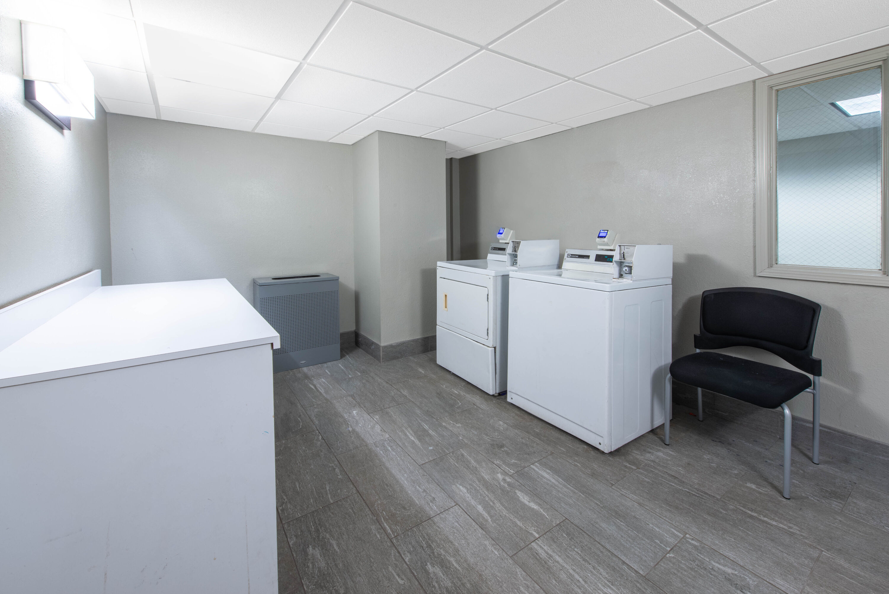 Laundry facilities at La Quinta Inn & Suites by Wyndham Tampa Brandon Regency Park in Brandon, Florida