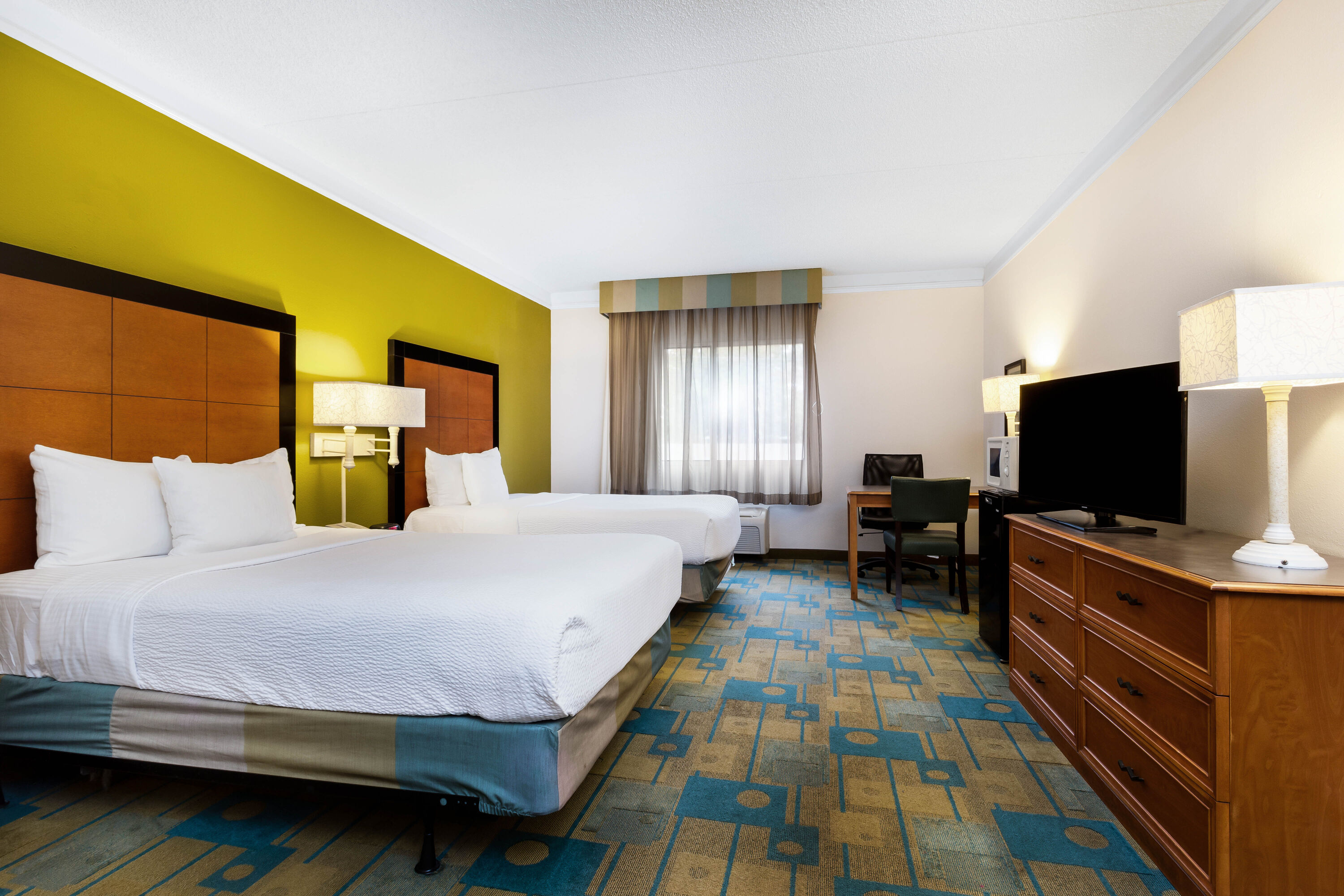 Guest room at the La Quinta Inn & Suites by Wyndham St. Pete-Clearwater Airpt in Clearwater, Florida