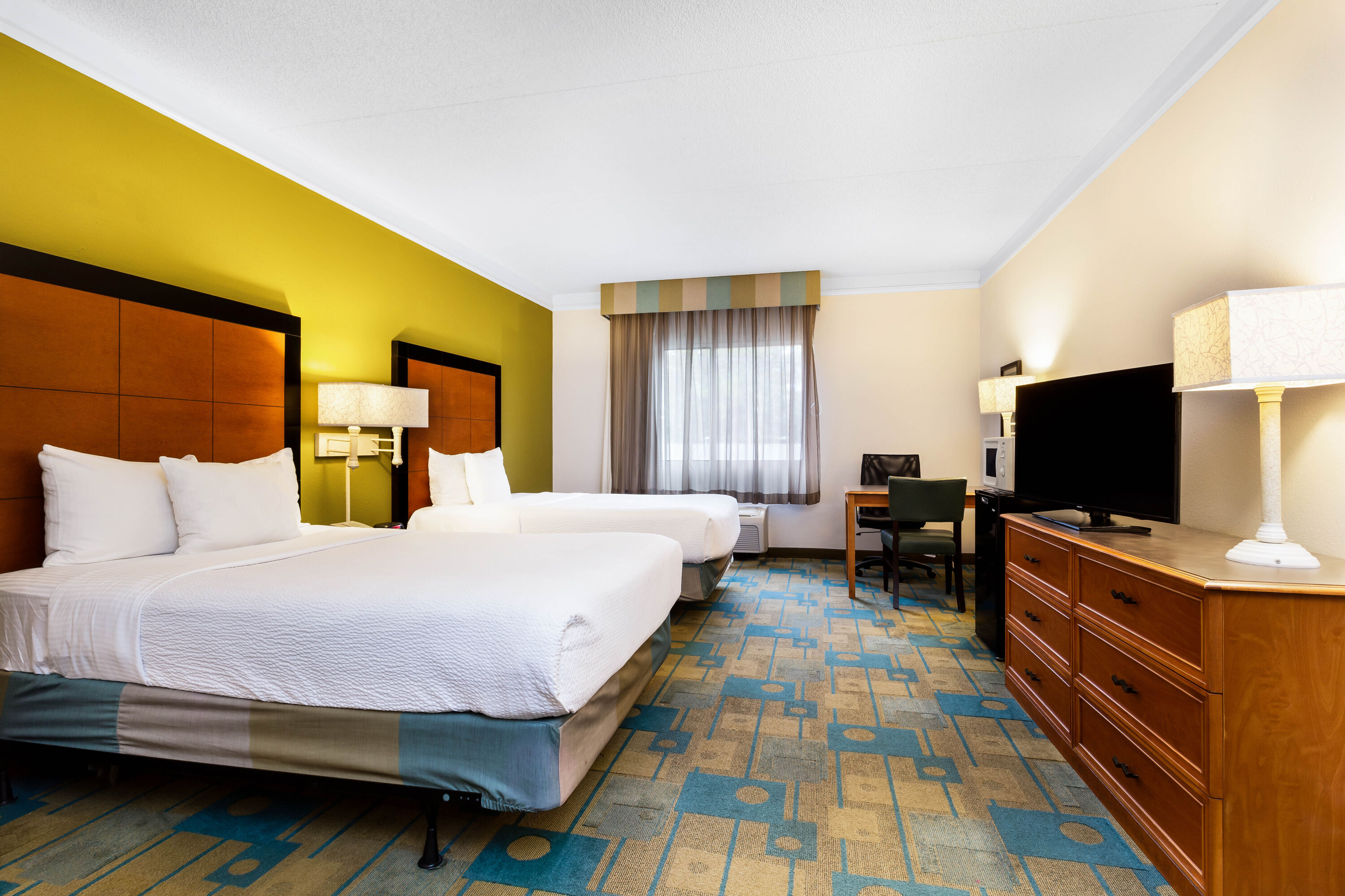 Guest room at the La Quinta Inn & Suites by Wyndham St. Pete-Clearwater Airpt in Clearwater, Florida