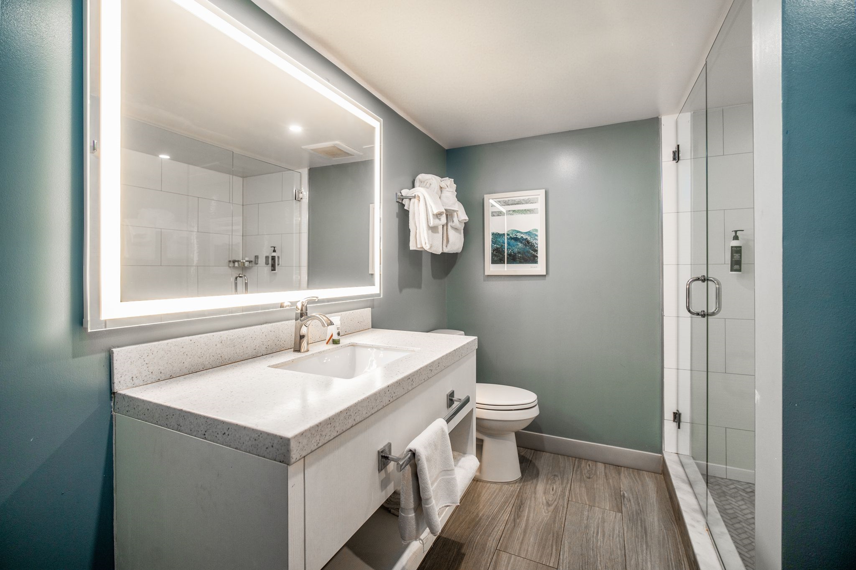 Guest room bath at the La Quinta Inn & Suites by Wyndham Cocoa Beach Oceanfront in Cocoa Beach, Florida