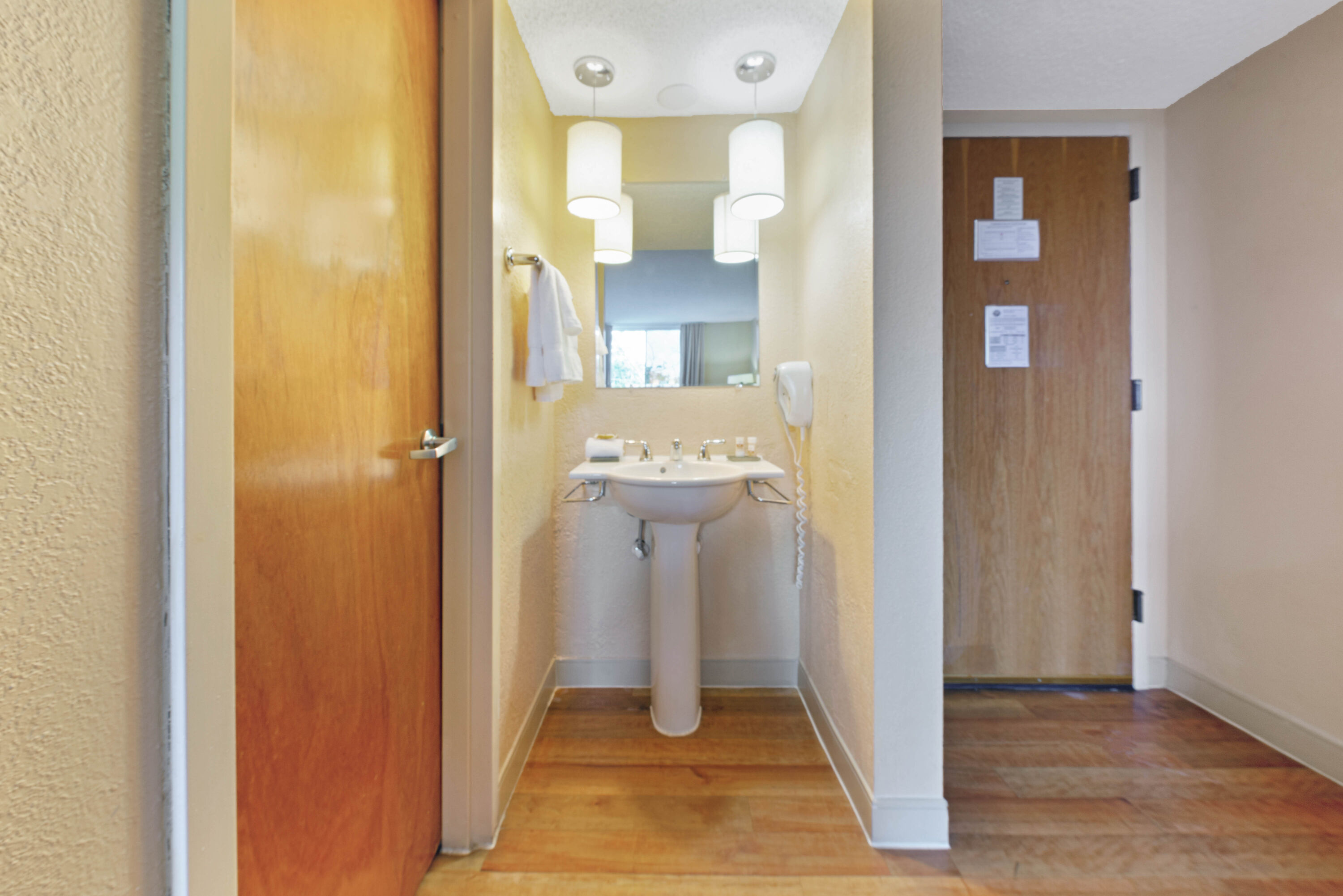 Guest room bath at the La Quinta Inn & Suites by Wyndham Coral Springs South in Coral Springs, Florida