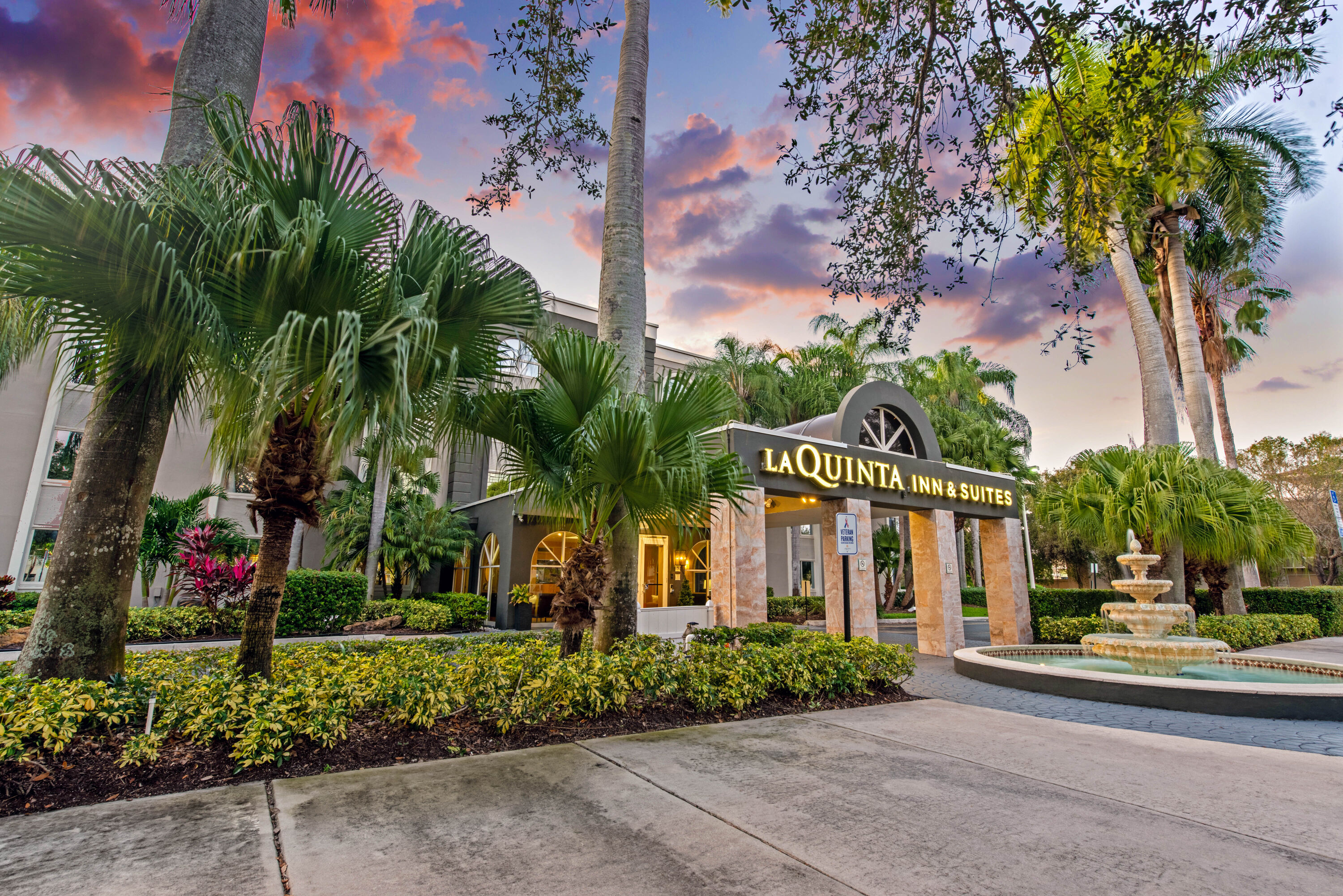 Exterior Dusk Image of La Quinta Inn & Suites by Wyndham Coral Springs South hotel in Coral Springs, Florida