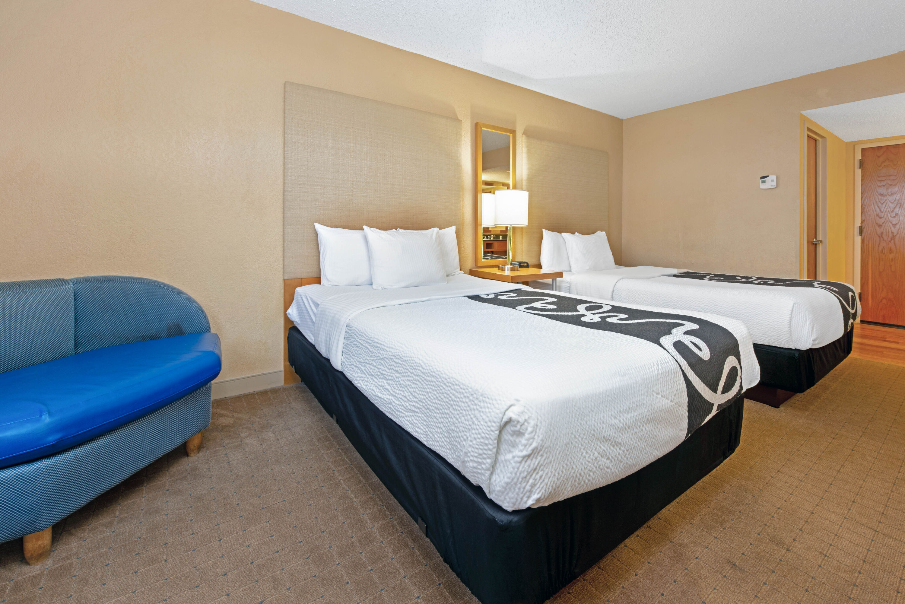 Guest room at the La Quinta Inn & Suites by Wyndham Coral Springs South in Coral Springs, Florida