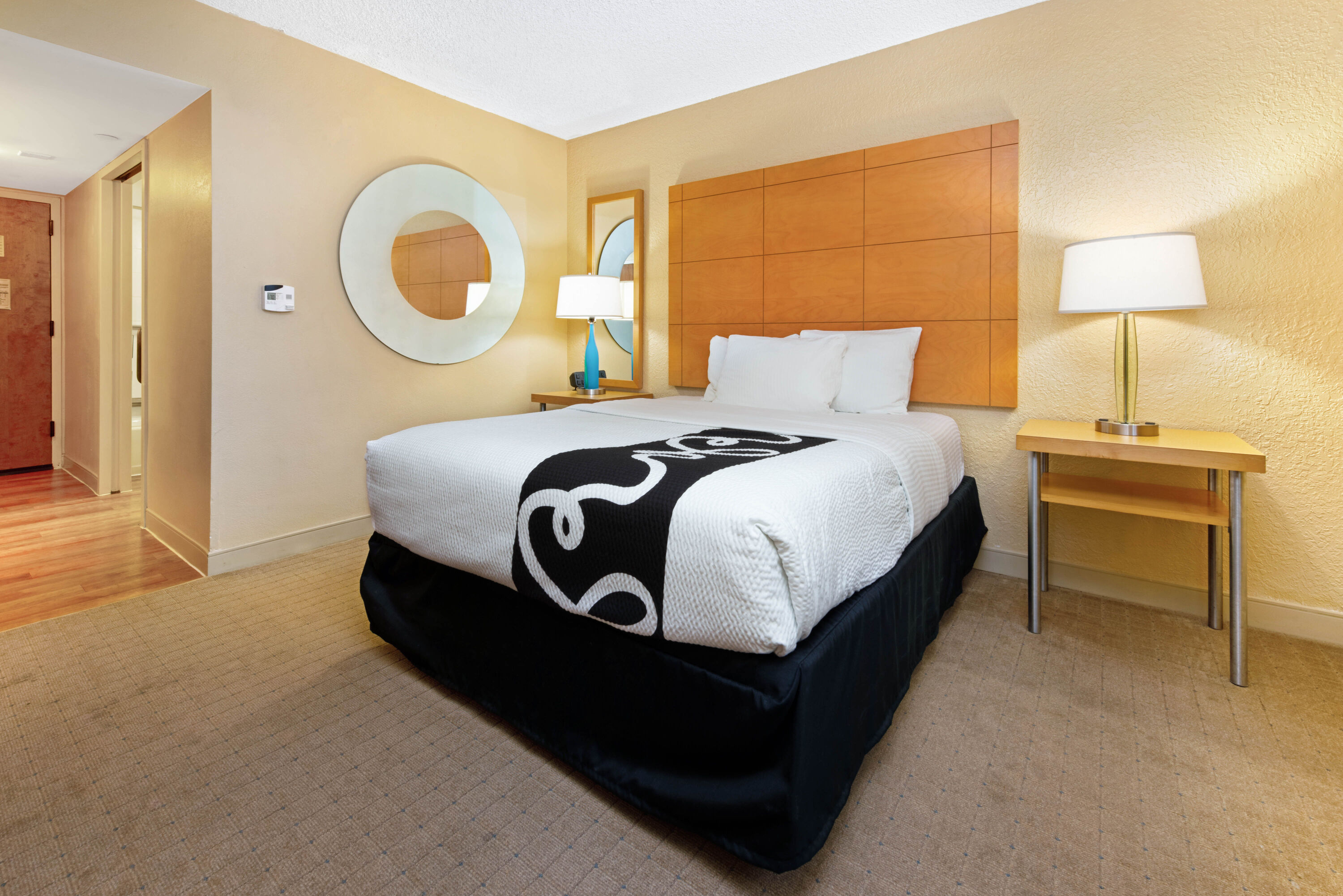 Guest room at the La Quinta Inn & Suites by Wyndham Coral Springs South in Coral Springs, Florida