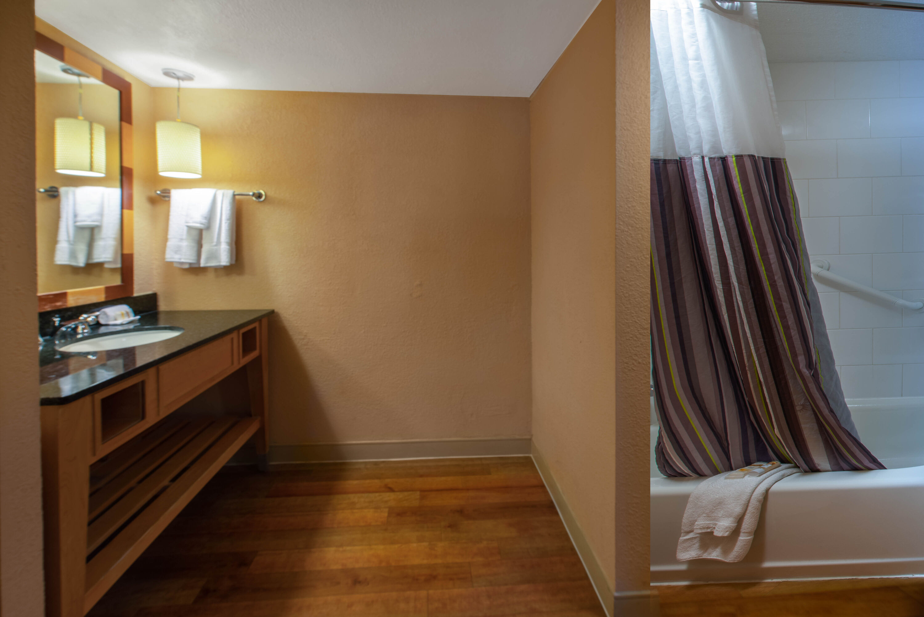 Guest room bath at the La Quinta Inn & Suites by Wyndham Deerfield Beach I-95 in Deerfield Beach, Florida