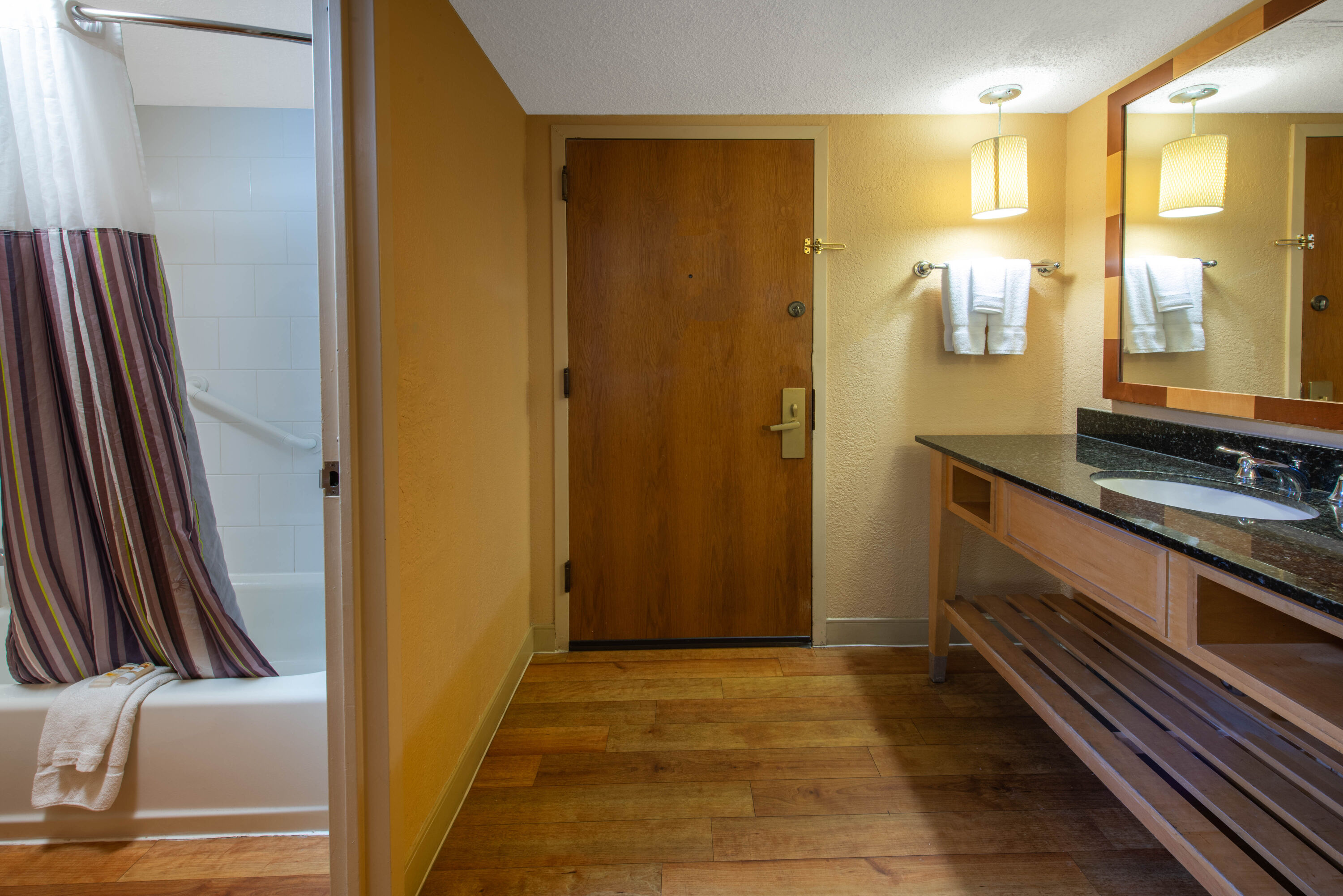 Guest room bath at the La Quinta Inn & Suites by Wyndham Deerfield Beach I-95 in Deerfield Beach, Florida