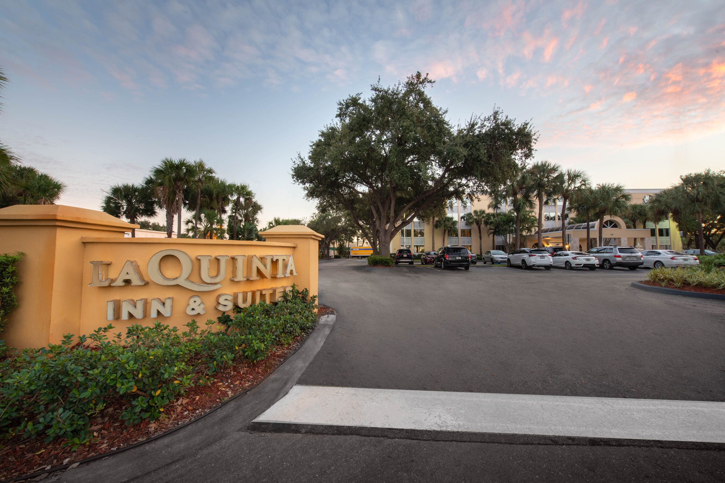 Exterior Dusk Image of La Quinta Inn & Suites by Wyndham Deerfield Beach I-95 hotel in Deerfield Beach, Florida