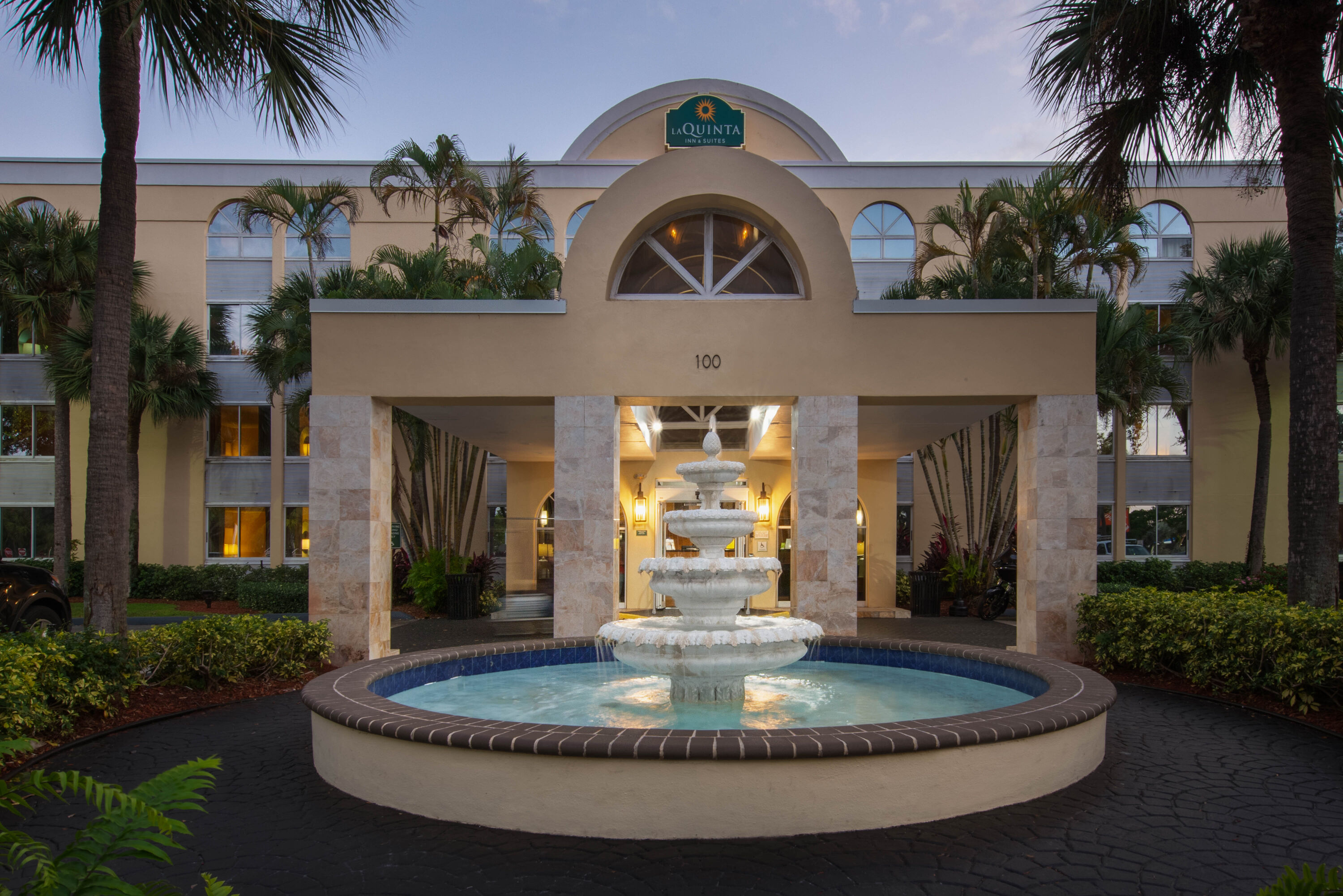 Exterior Dusk Image of La Quinta Inn & Suites by Wyndham Deerfield Beach I-95 hotel in Deerfield Beach, Florida