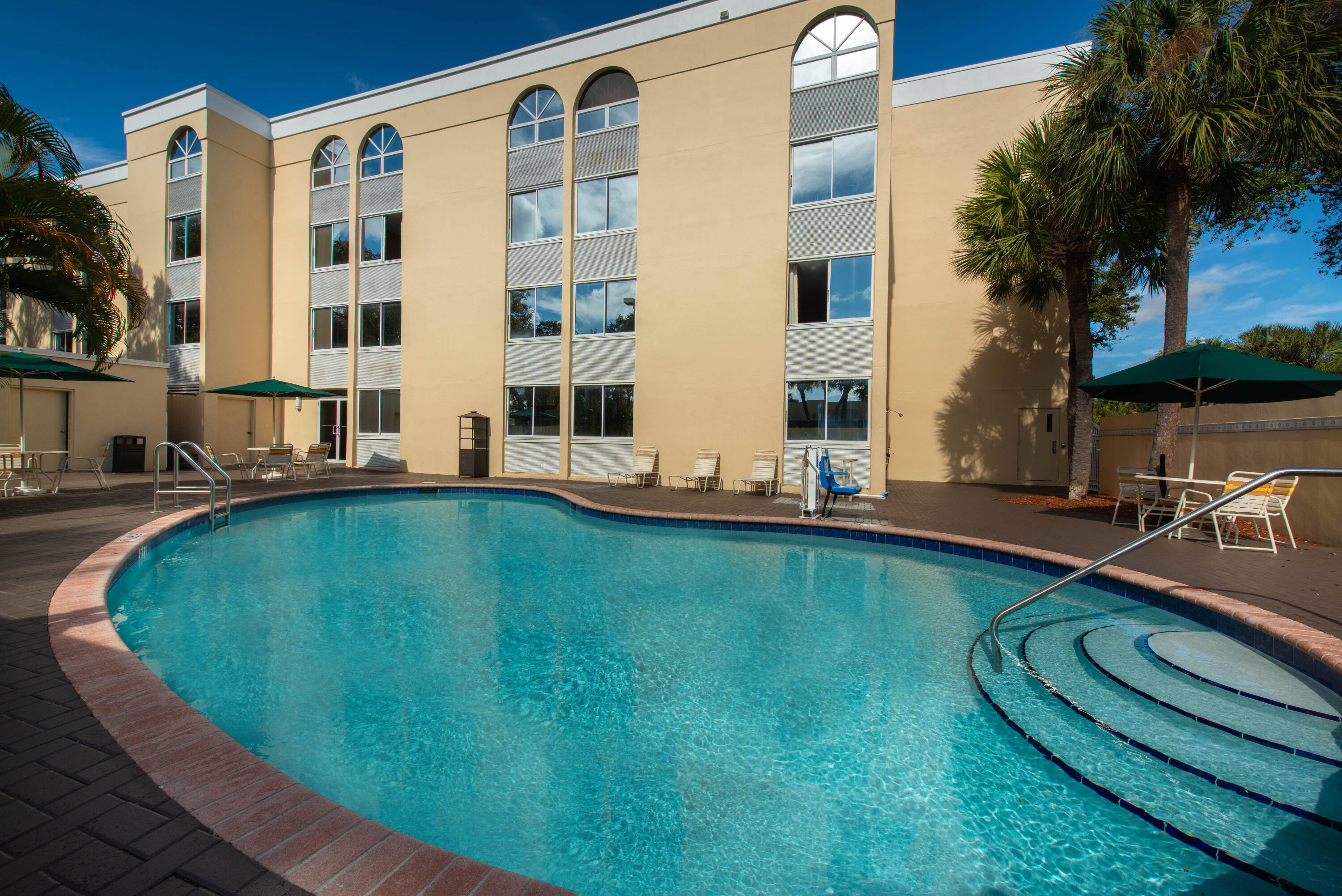Pool at the La Quinta Inn & Suites by Wyndham Deerfield Beach I-95 in Deerfield Beach, Florida