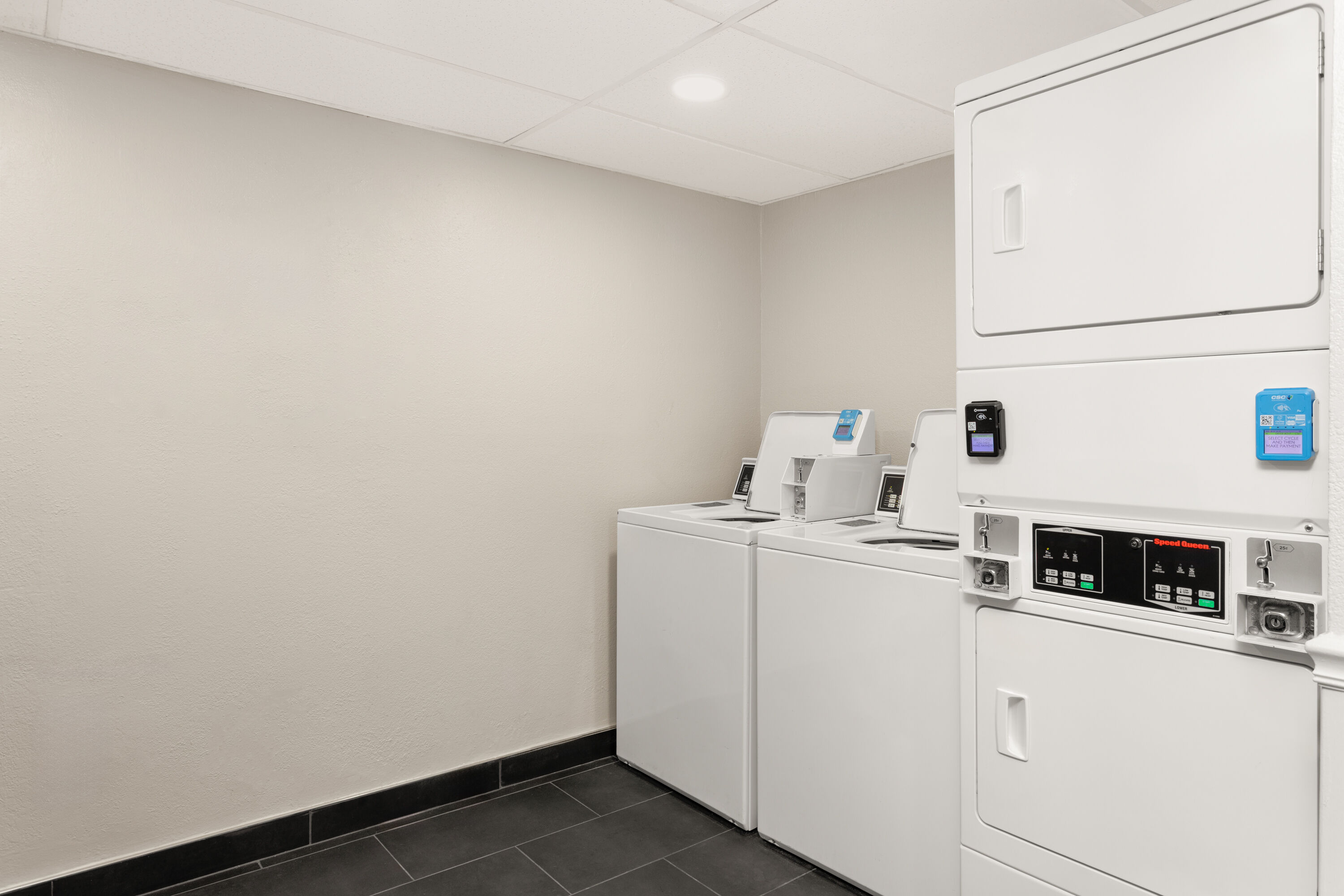 Laundry facilities at La Quinta Inn & Suites by Wyndham Ft Lauderdale Cypress Cr in Fort Lauderdale, Florida