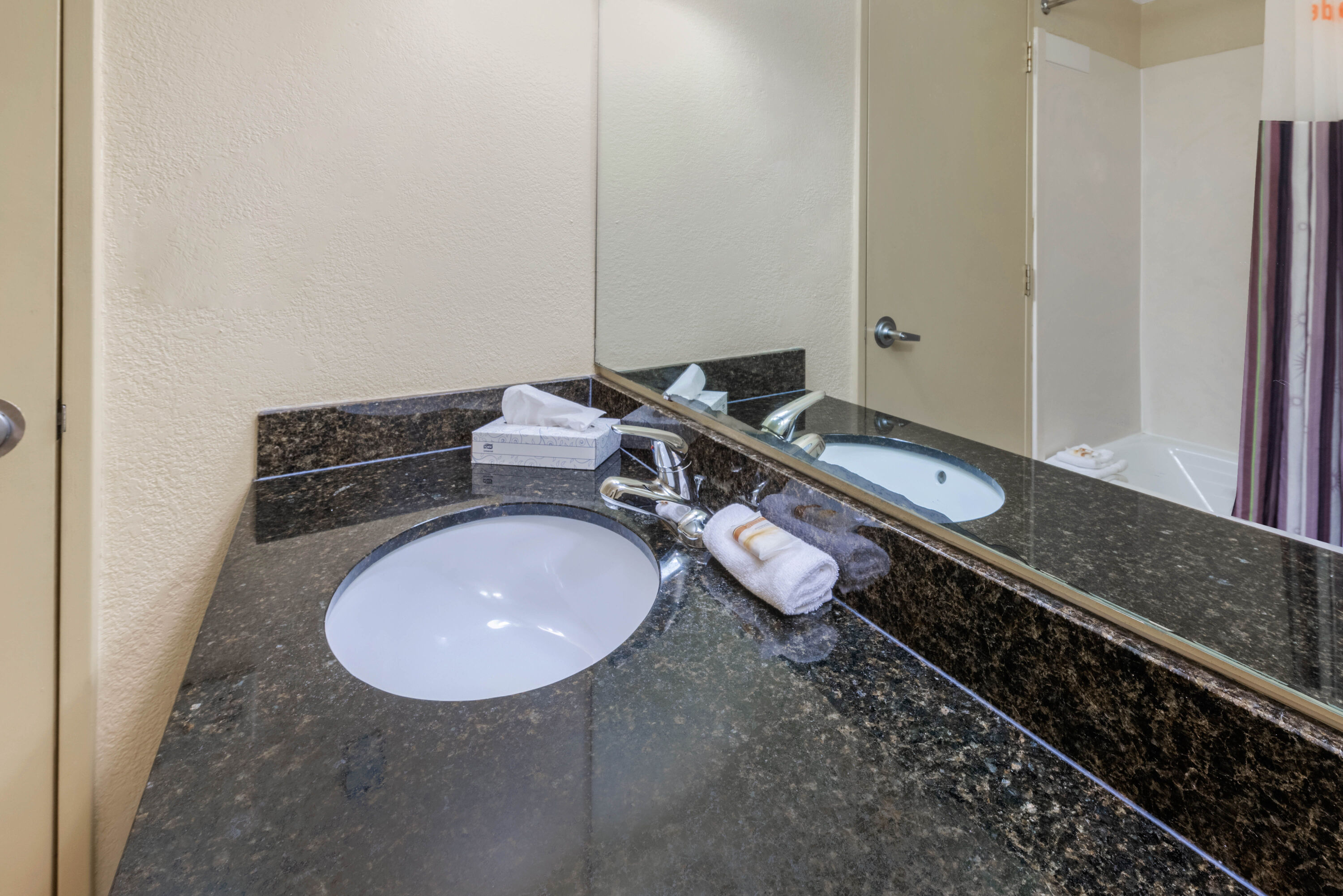 Guest room bath at the La Quinta by Wyndham Fort Lauderdale Pompano Beach in Fort Lauderdale, Florida