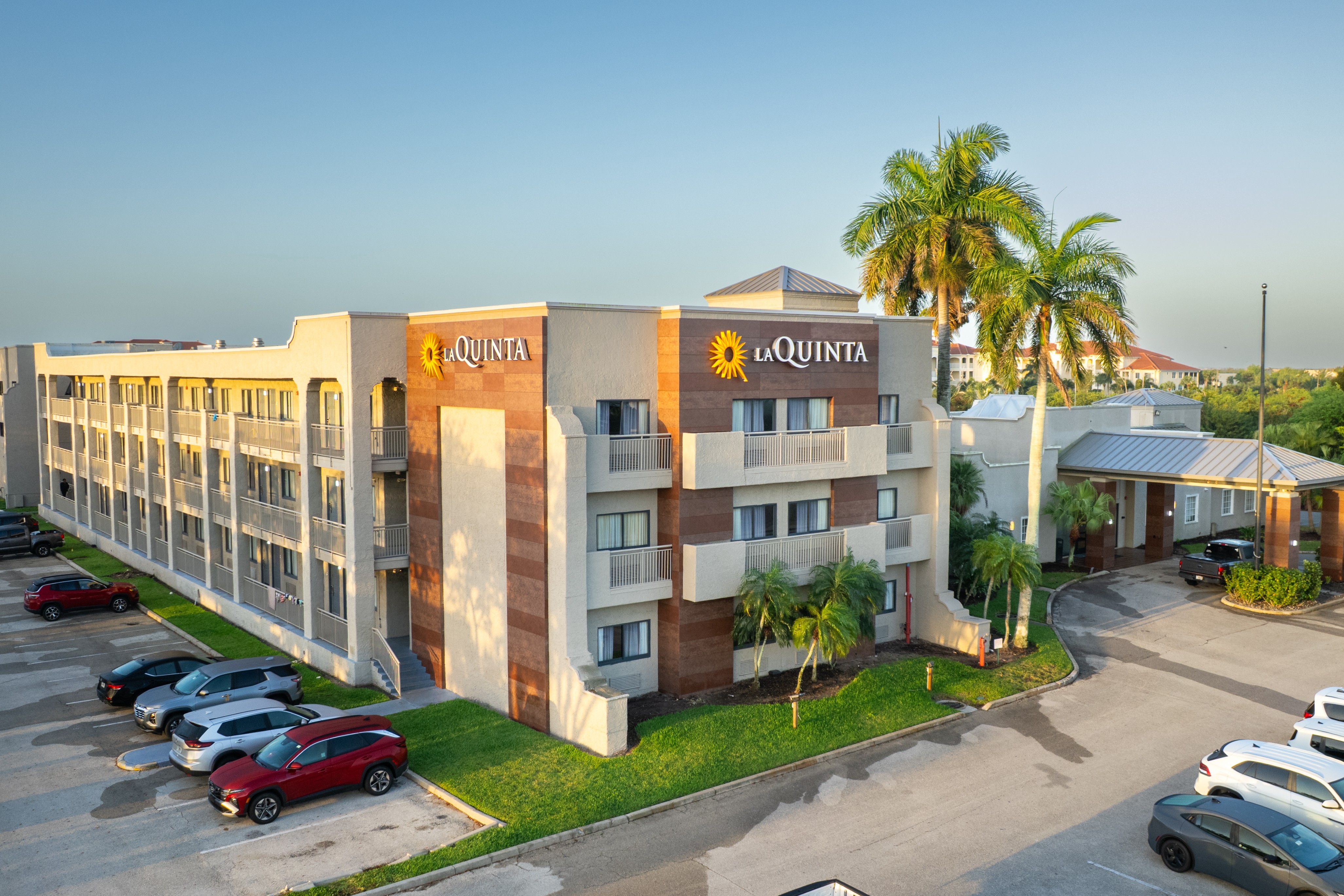Exterior of La Quinta Inn & Suites by Wyndham Ft. Myers-Sanibel Gateway hotel in Fort Myers, Florida