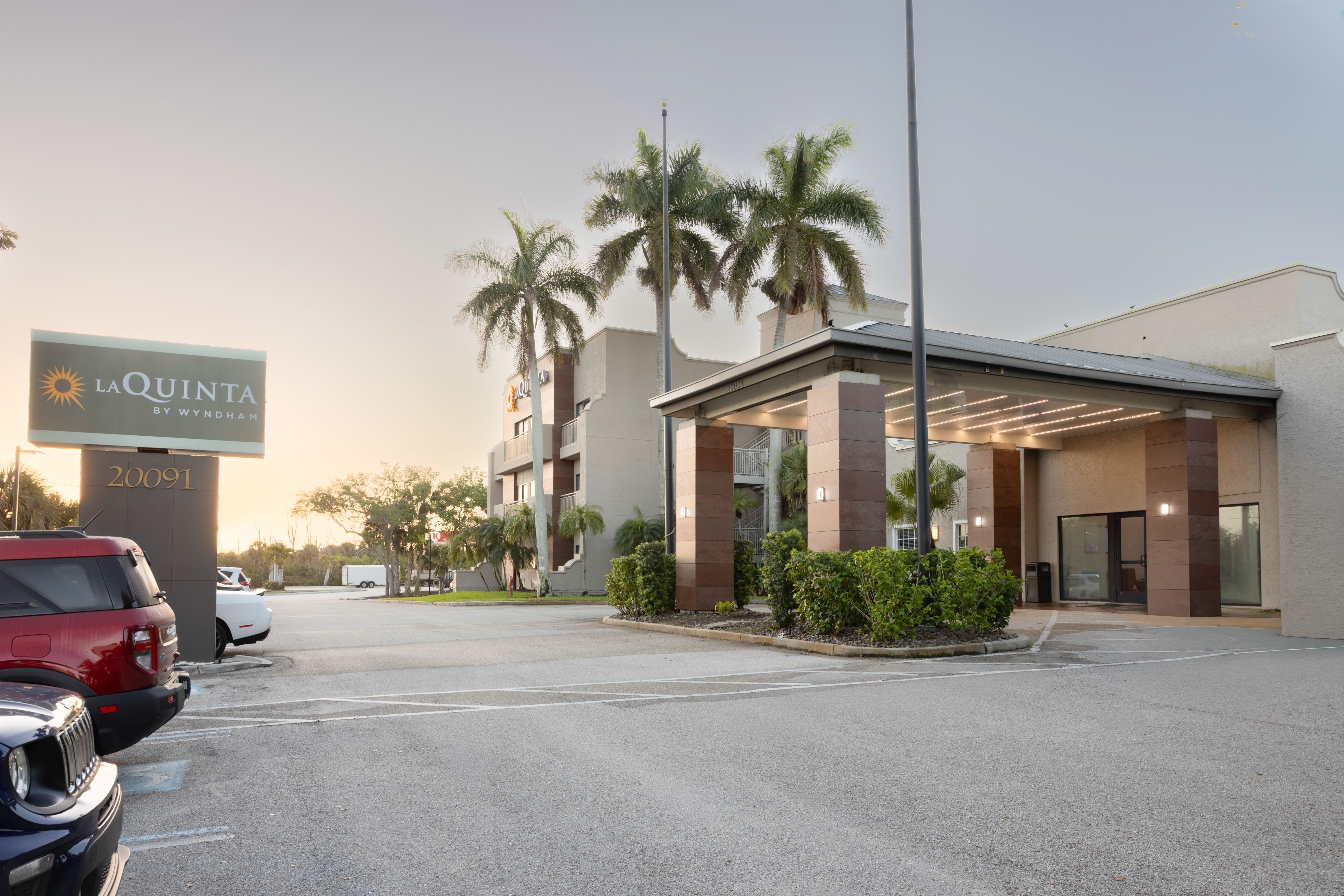 Exterior of La Quinta Inn & Suites by Wyndham Ft. Myers-Sanibel Gateway hotel in Fort Myers, Florida