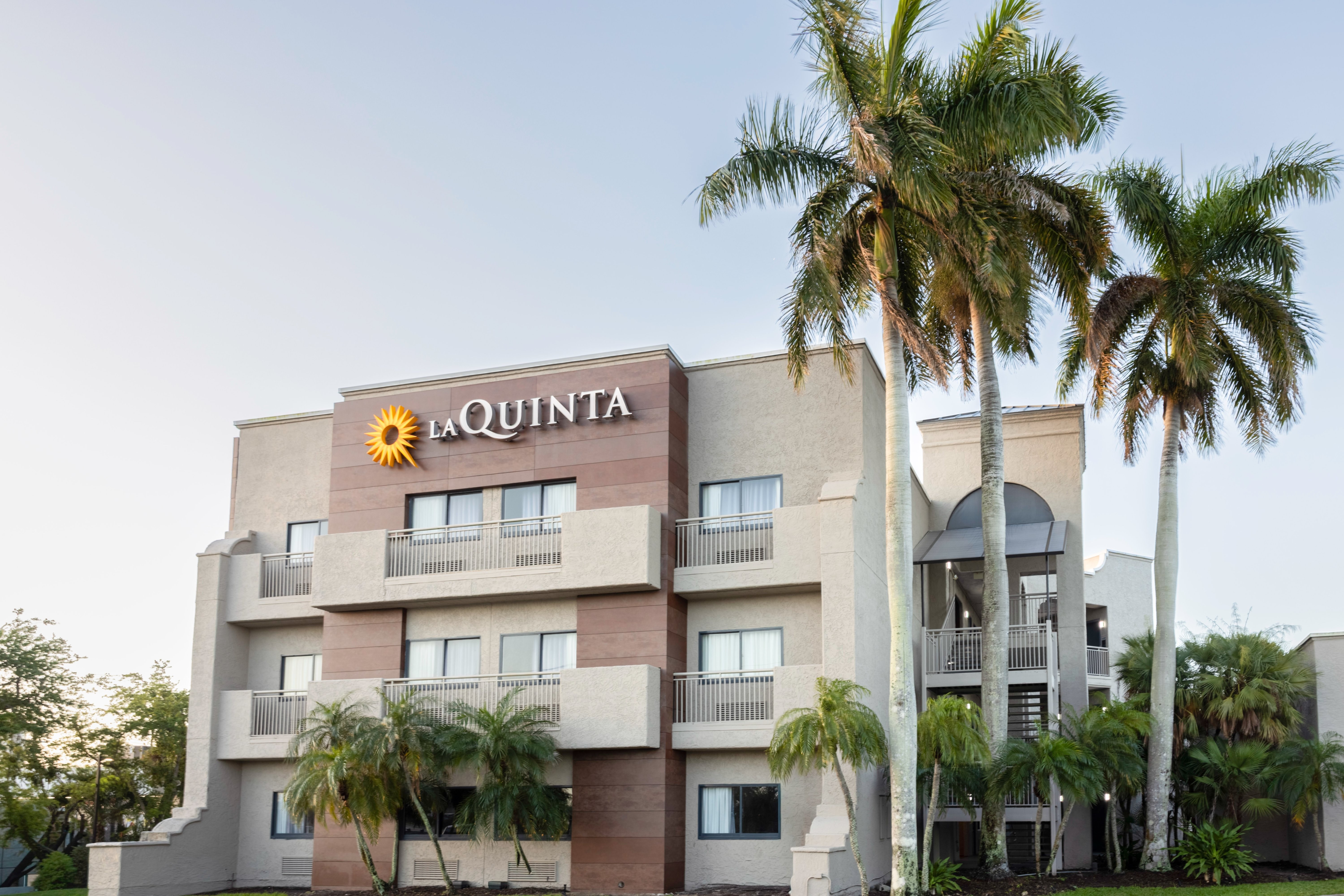 Exterior of La Quinta Inn & Suites by Wyndham Ft. Myers-Sanibel Gateway hotel in Fort Myers, Florida