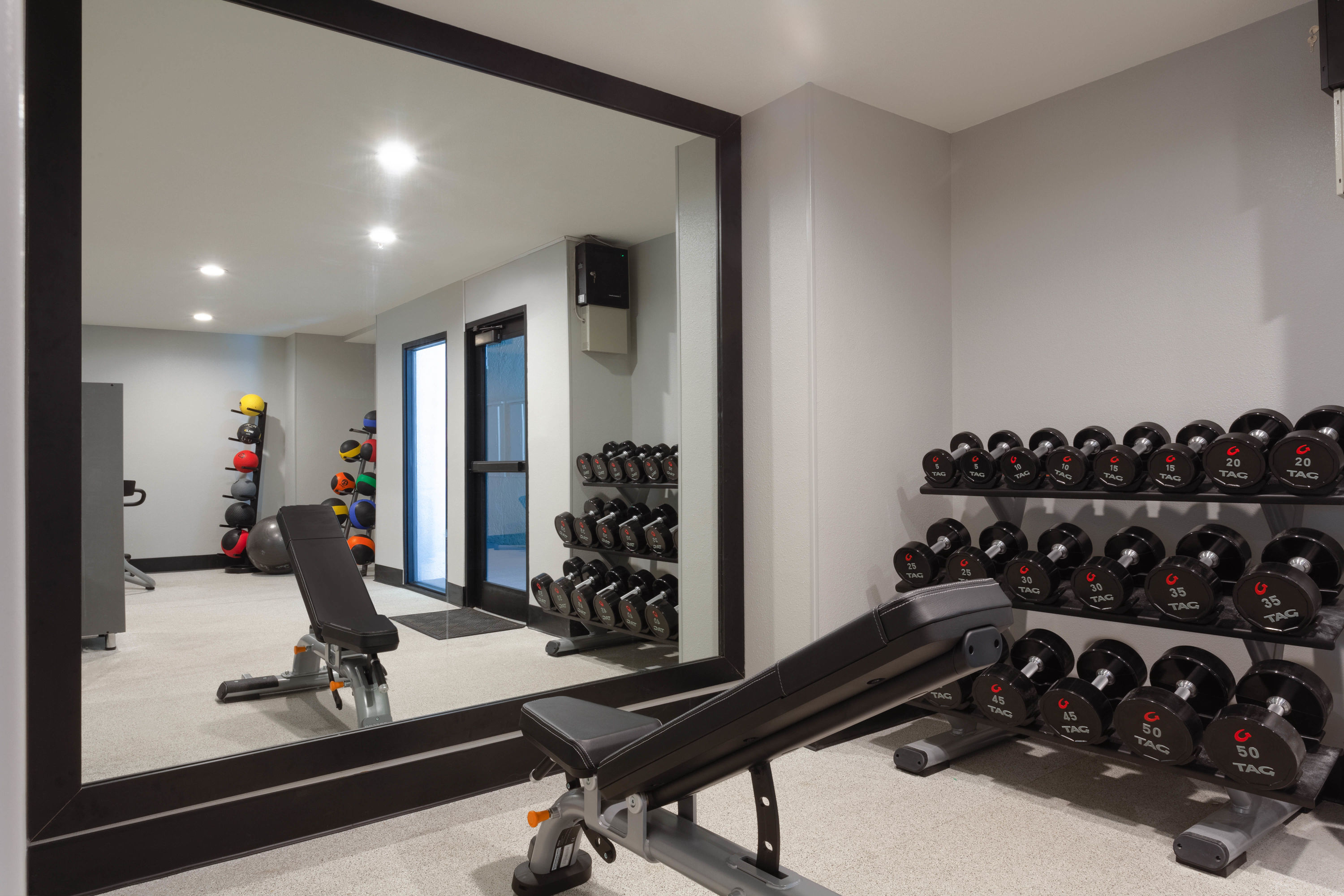 Fitness room at La Quinta Inn & Suites by Wyndham Ft. Myers-Sanibel Gateway in Fort Myers, Florida