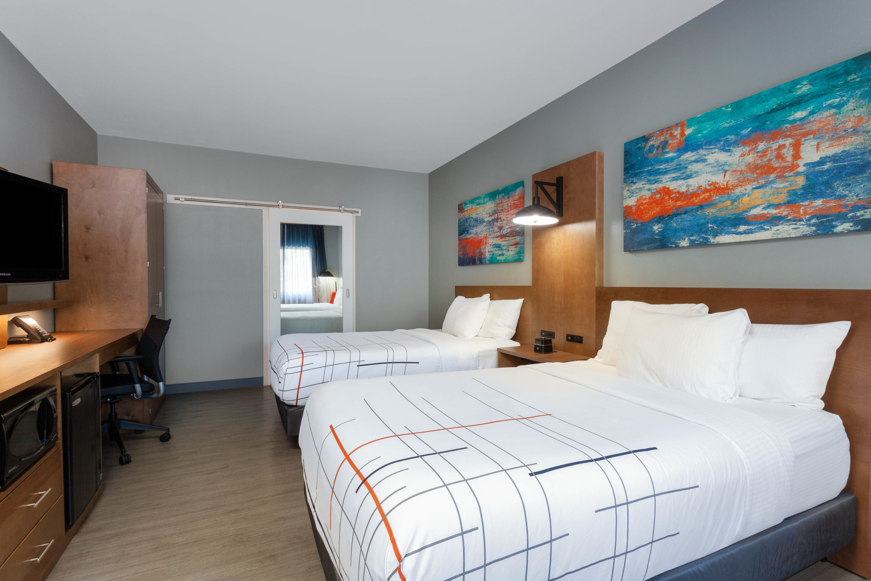 Guest room at the La Quinta Inn & Suites by Wyndham Ft. Myers-Sanibel Gateway in Fort Myers, Florida