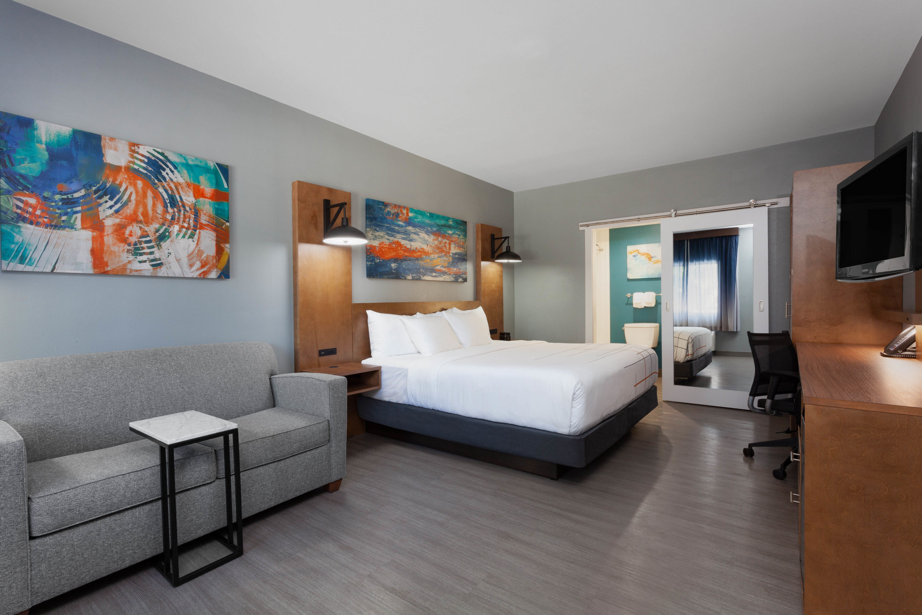 Guest room at the La Quinta Inn & Suites by Wyndham Ft. Myers-Sanibel Gateway in Fort Myers, Florida