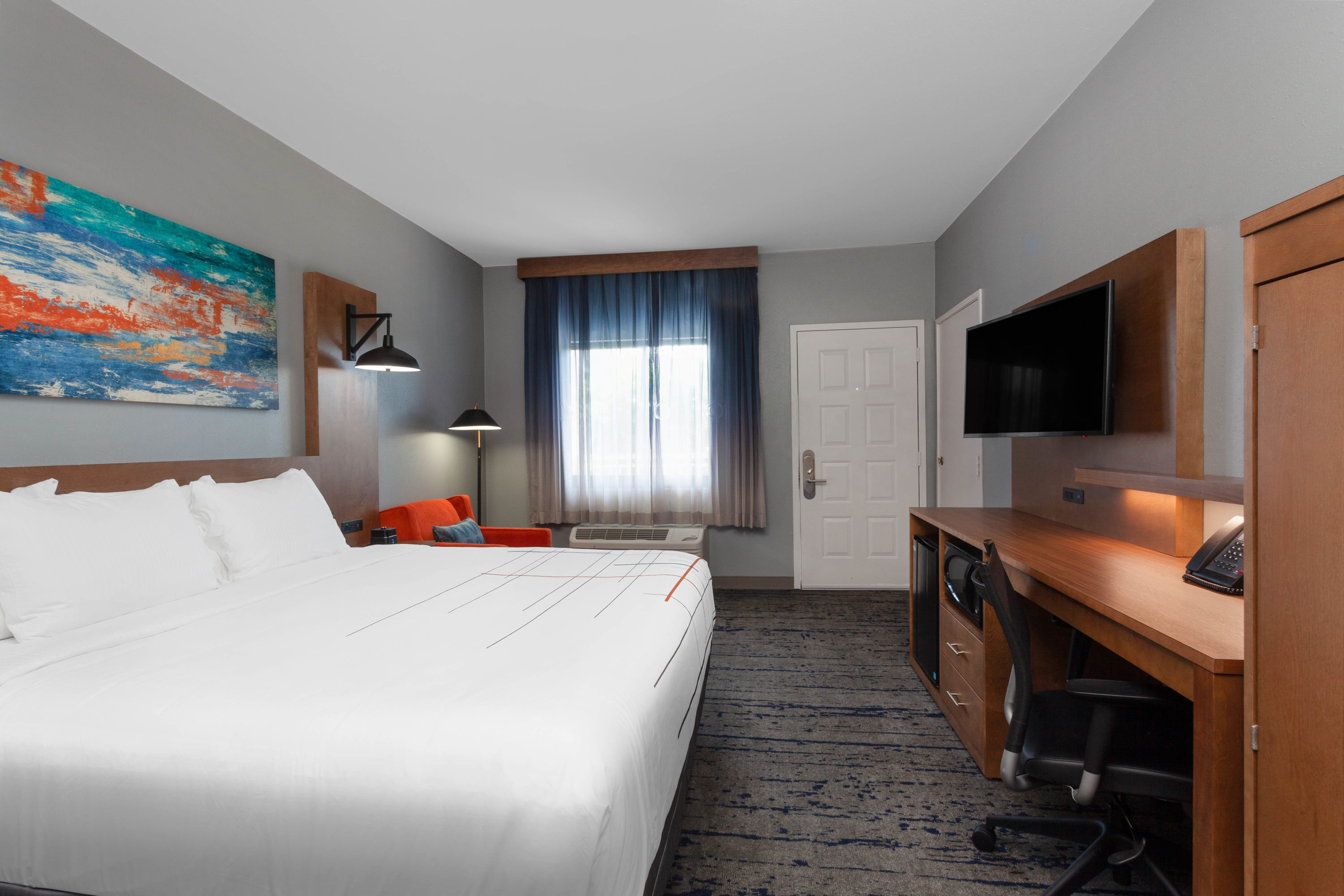 Guest room at the La Quinta Inn & Suites by Wyndham Ft. Myers-Sanibel Gateway in Fort Myers, Florida