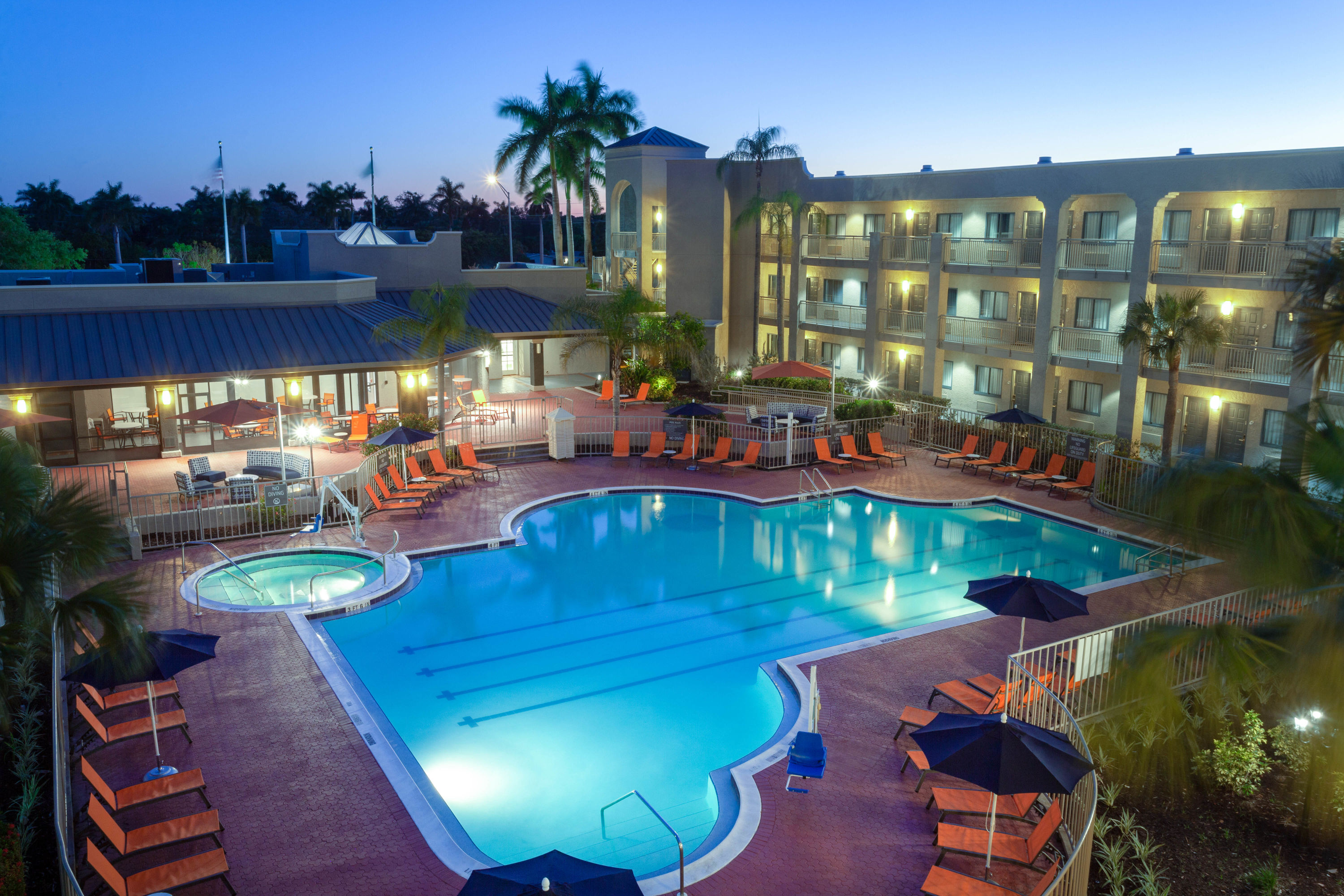 Pool night image at the La Quinta Inn & Suites by Wyndham Ft. Myers-Sanibel Gateway in Fort Myers, Florida
