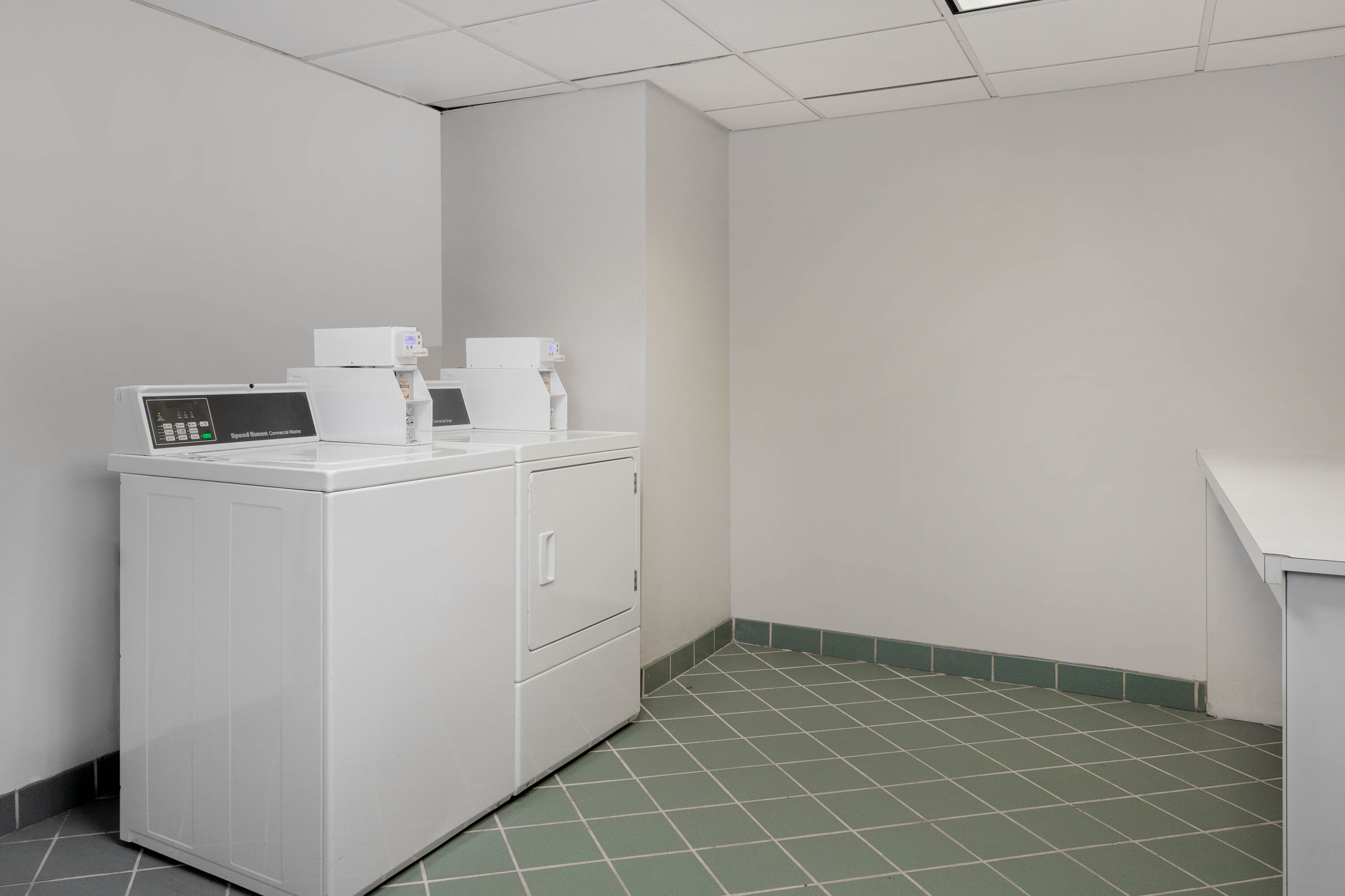 Laundry facilities at La Quinta Inn & Suites by Wyndham Lakeland West in Lakeland, Florida