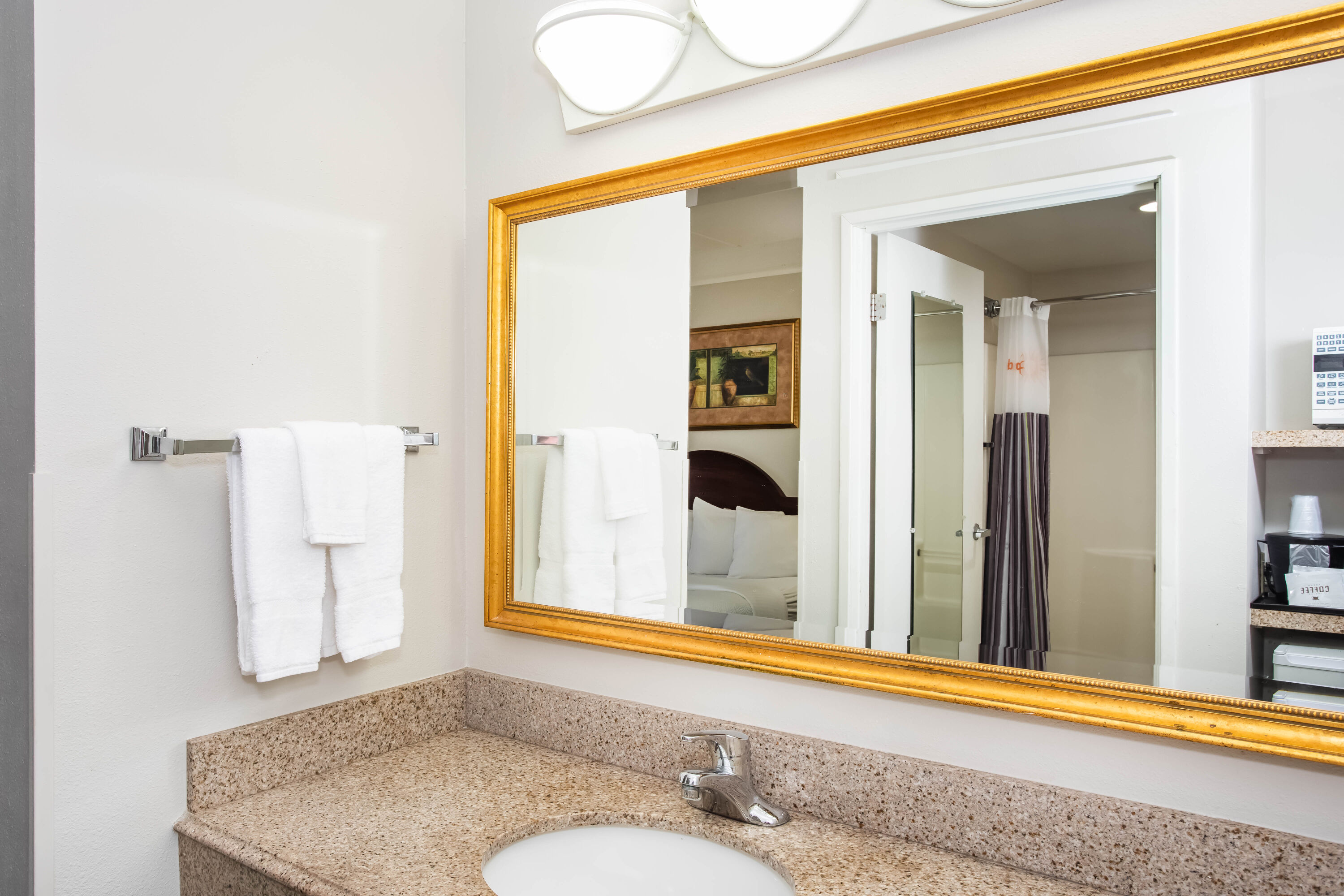Guest room bath at the La Quinta Inn & Suites by Wyndham Melbourne Viera in Melbourne, Florida