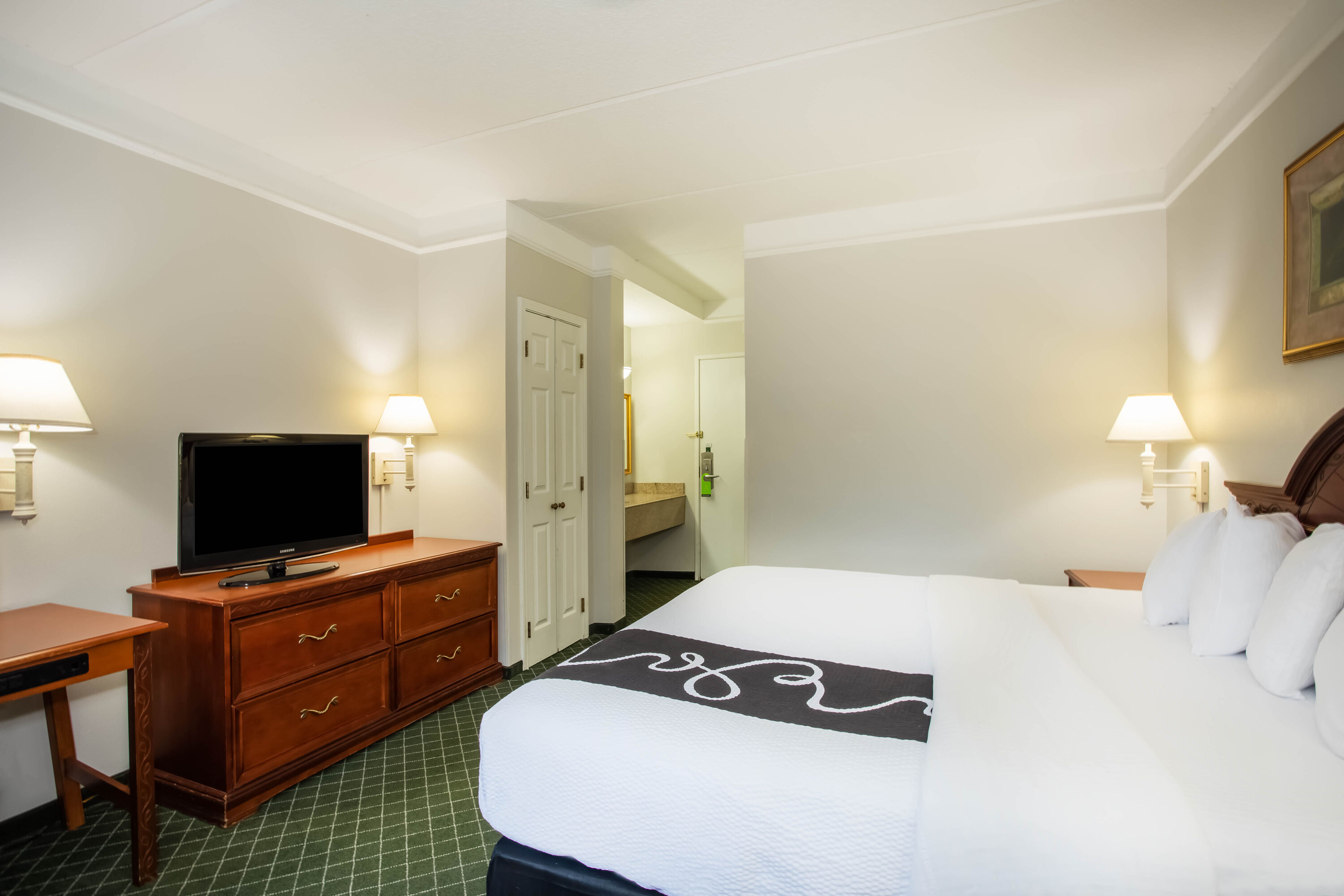 Guest room at the La Quinta Inn & Suites by Wyndham Melbourne Viera in Melbourne, Florida