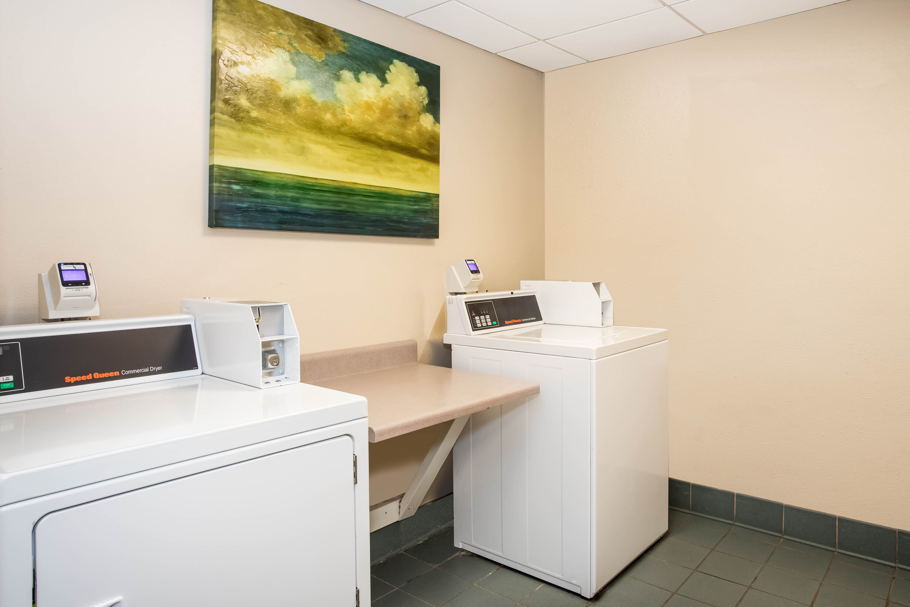 Laundry facilities at La Quinta Inn & Suites by Wyndham Melbourne Viera in Melbourne, Florida