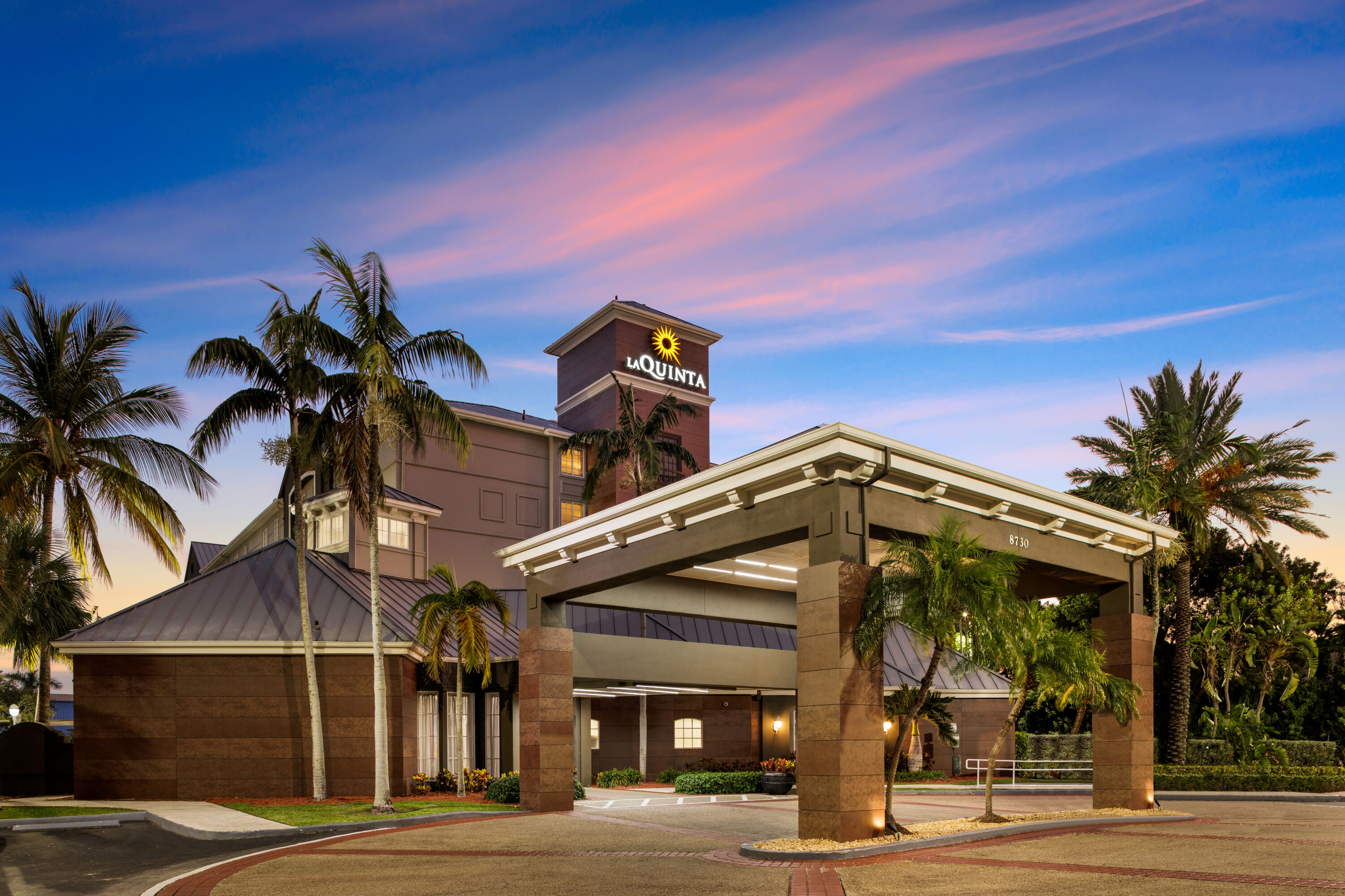 Exterior Dusk Image of La Quinta Inn & Suites by Wyndham Miami Airport West hotel in Miami, Florida