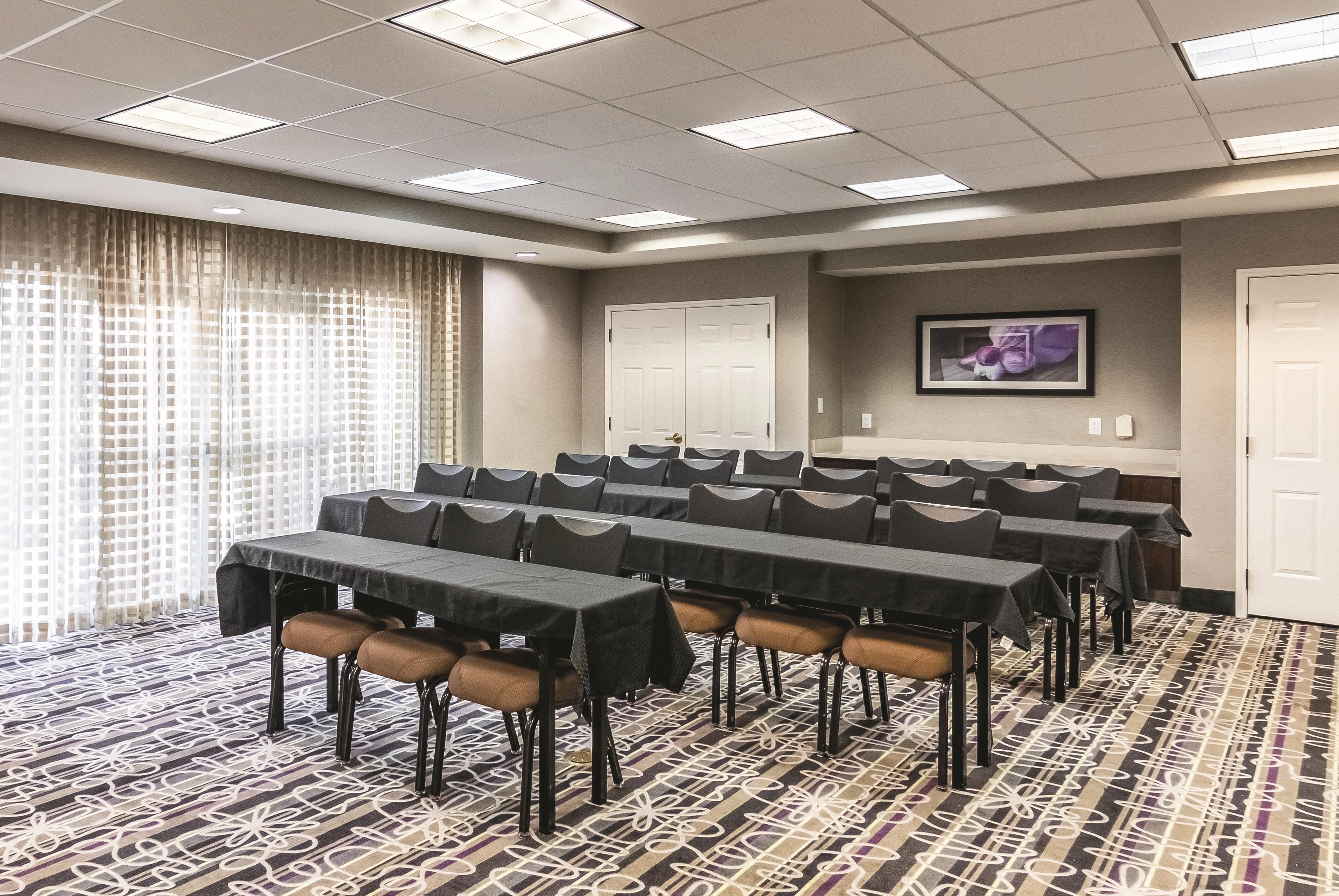 Meeting room at La Quinta Inn & Suites by Wyndham Orlando Airport in Orlando, Florida