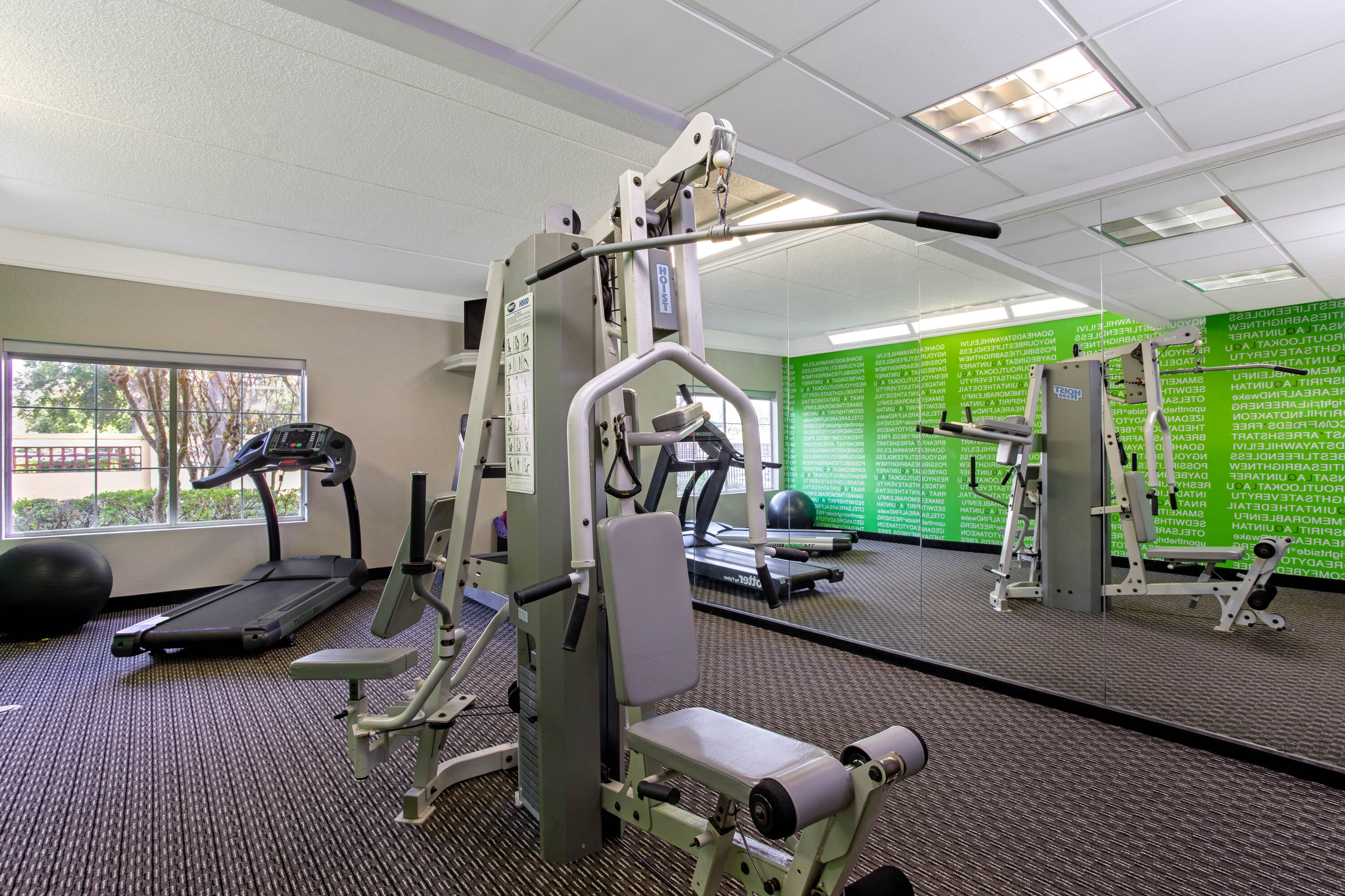 Fitness room at La Quinta Inn & Suites by Wyndham Orlando Airport North in Orlando, Florida