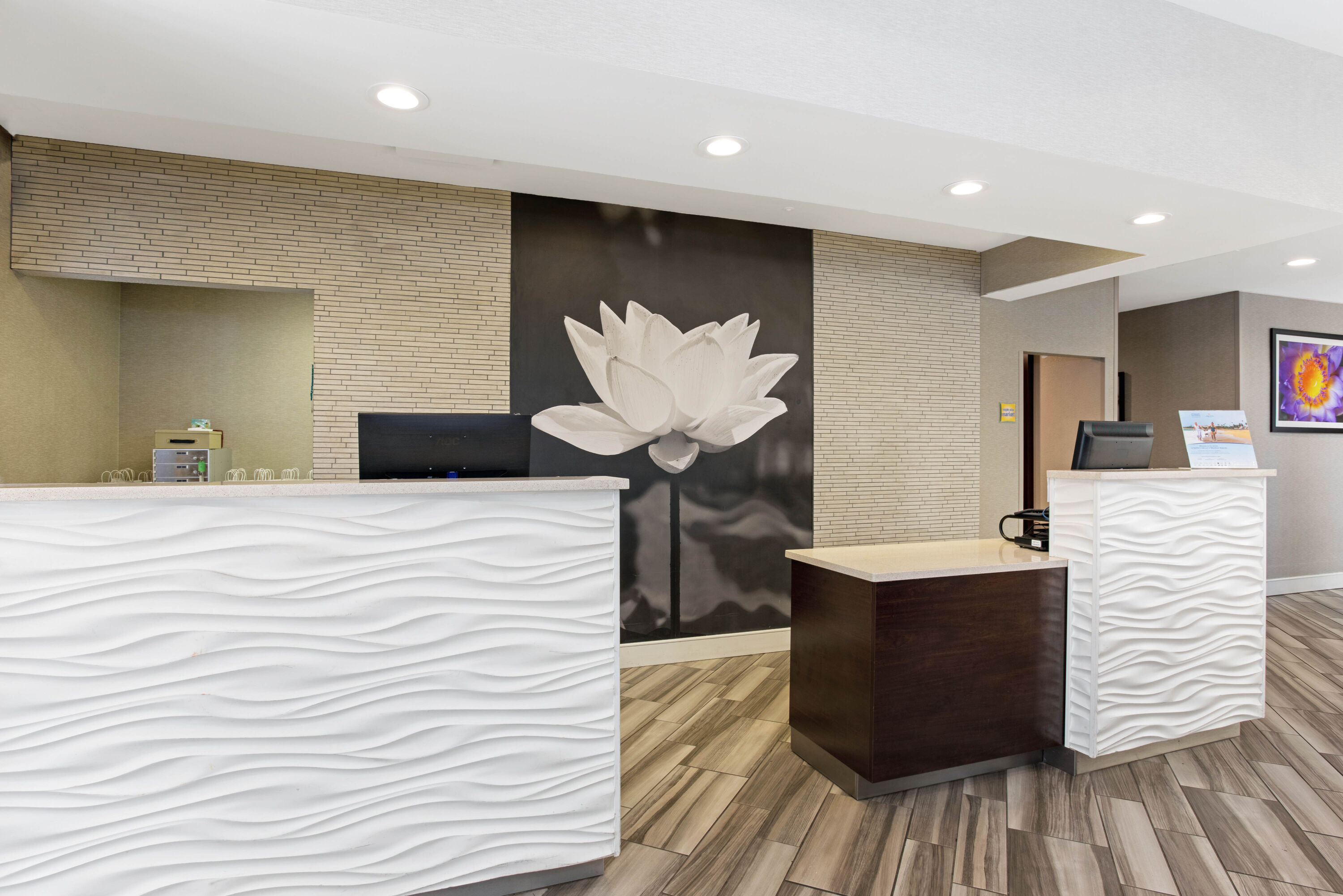 La Quinta Inn & Suites by Wyndham Orlando Airport North reception in Orlando, Florida