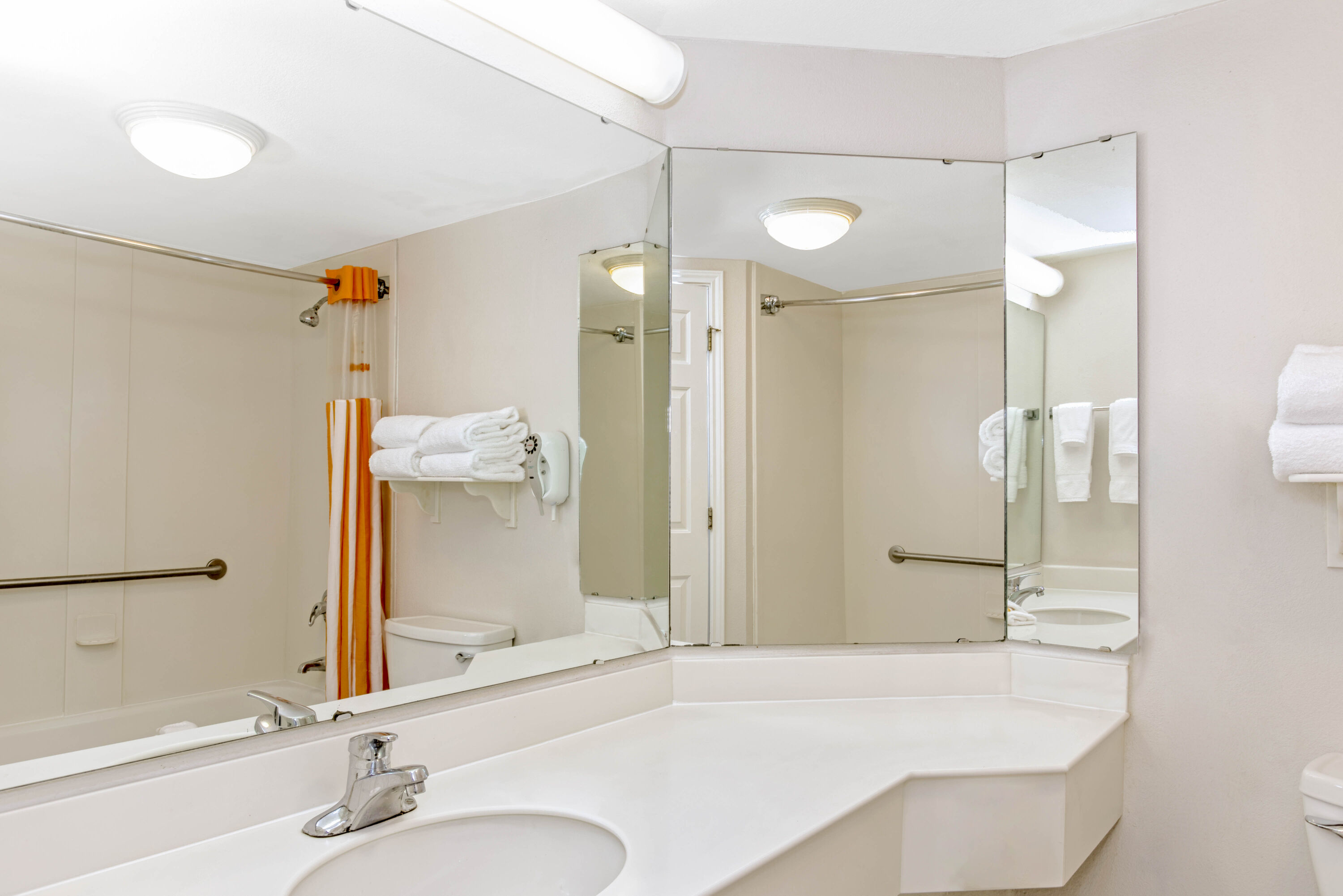 Guest room bath at the La Quinta Inn & Suites by Wyndham Orlando I Drive/Conv Ctr in Orlando, Florida