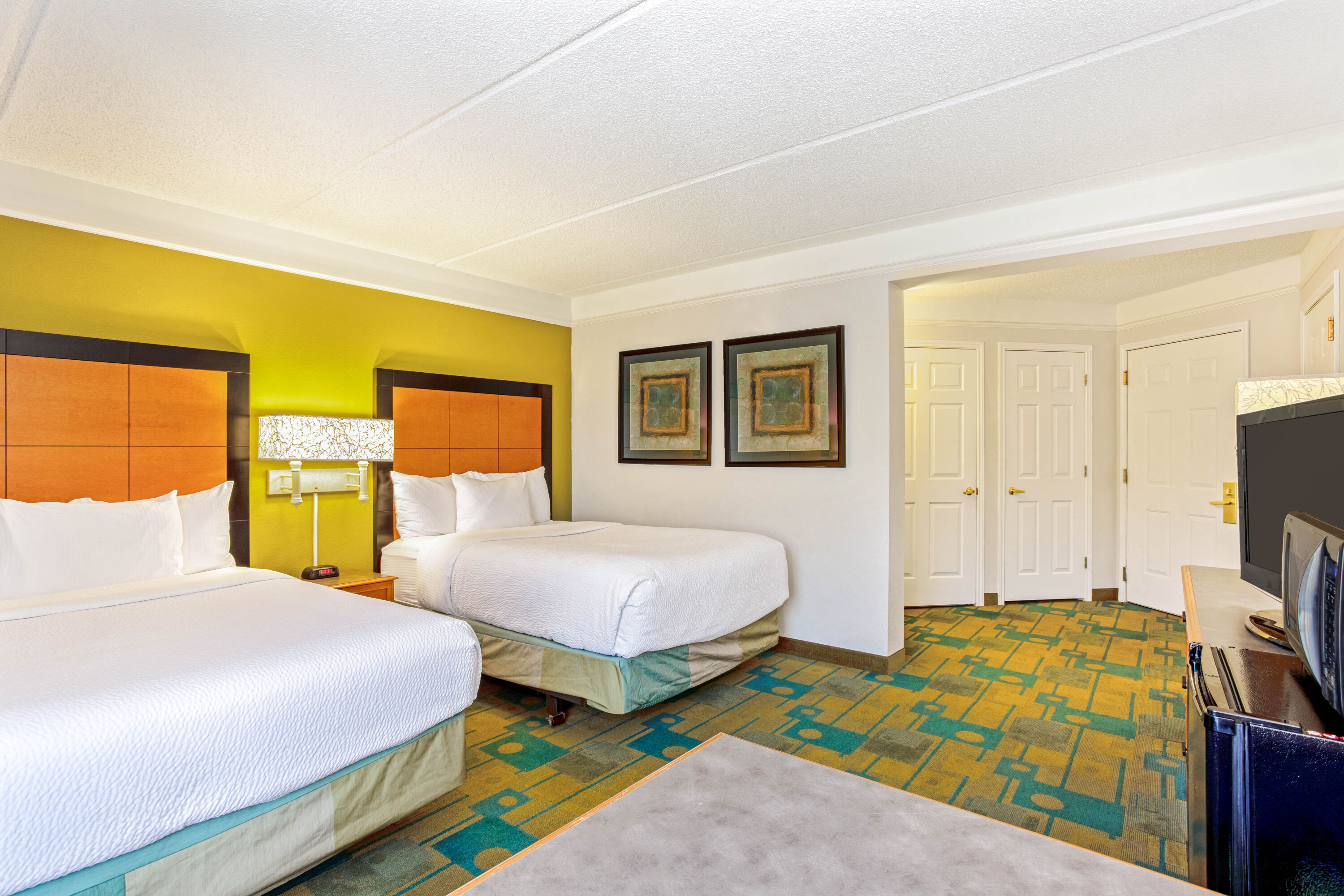 Guest room at the La Quinta Inn & Suites by Wyndham Orlando I Drive/Conv Ctr in Orlando, Florida