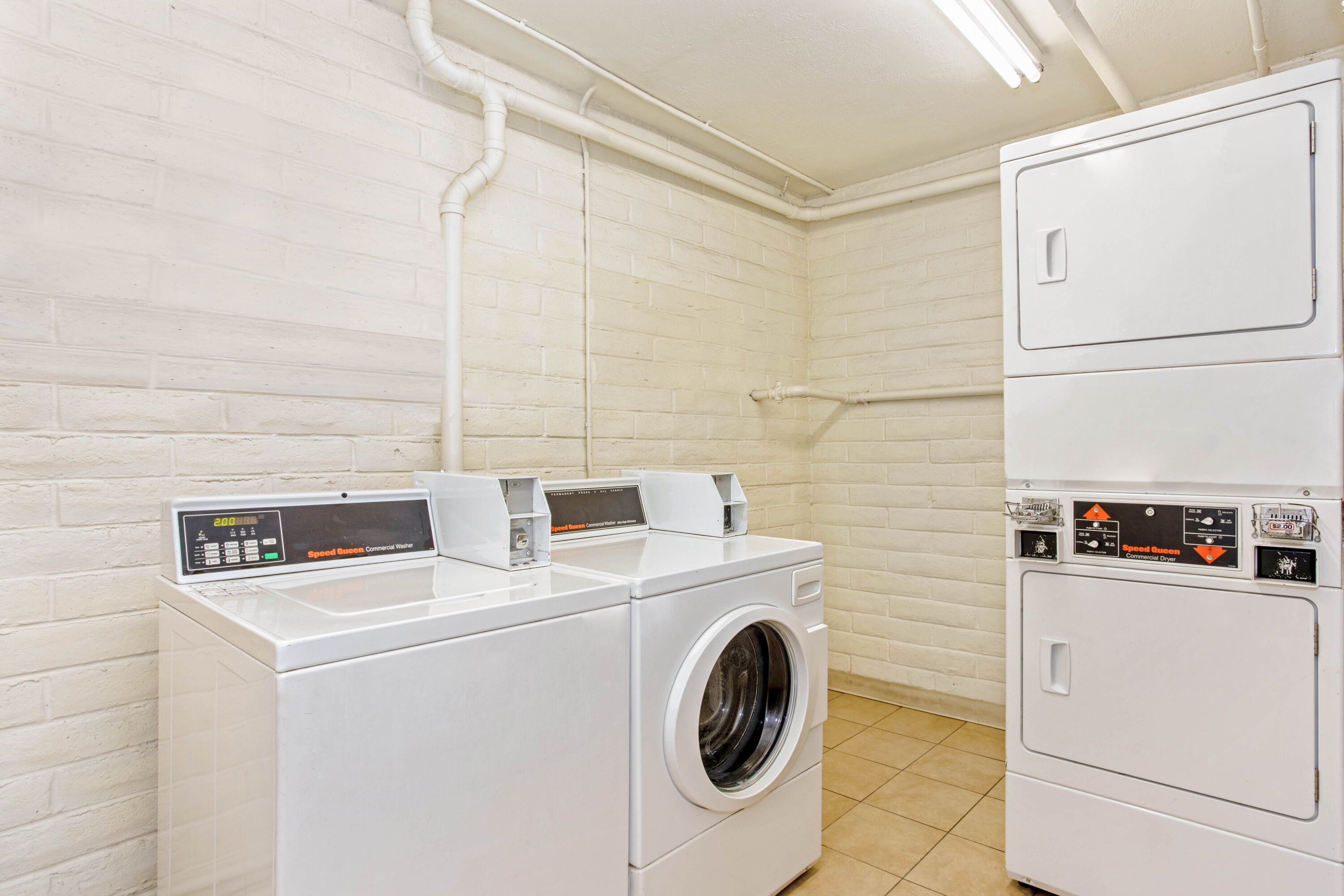 Laundry facilities at La Quinta Inn by Wyndham Orlando Airport West in Orlando, Florida