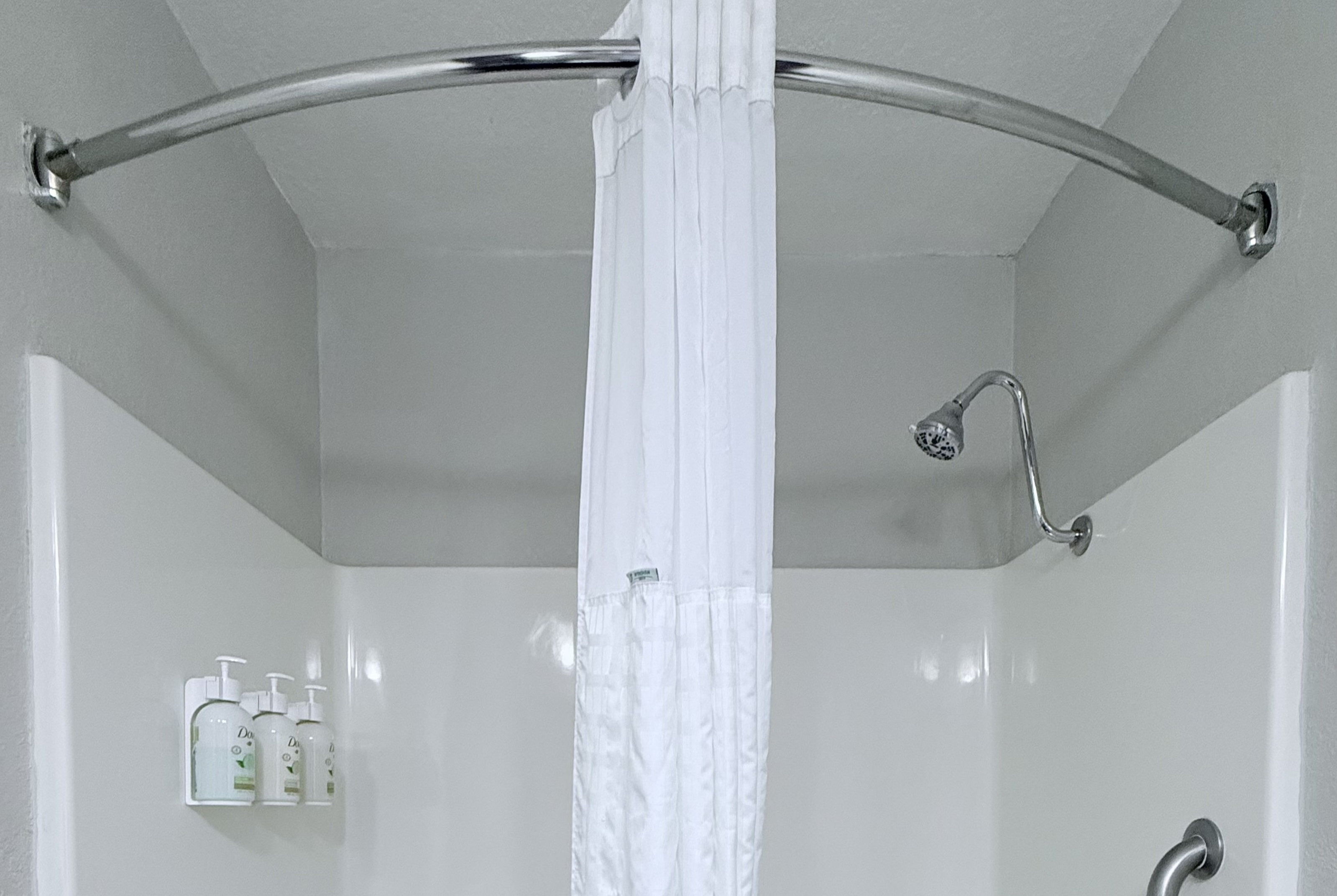 Guest room bath at the La Quinta Inn & Suites by Wyndham Orlando Universal area in Orlando, Florida