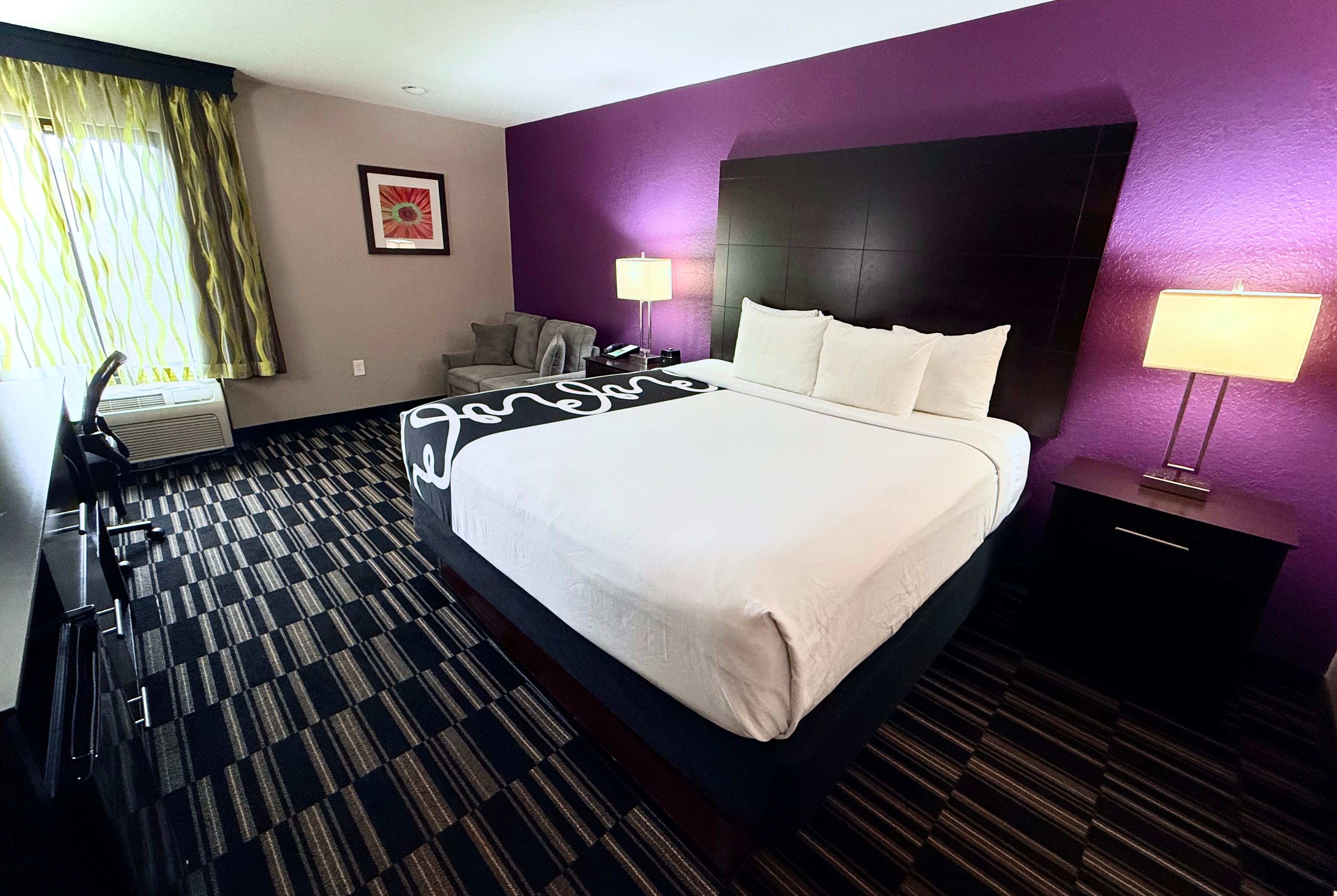 Guest room at the La Quinta Inn & Suites by Wyndham Orlando Universal area in Orlando, Florida