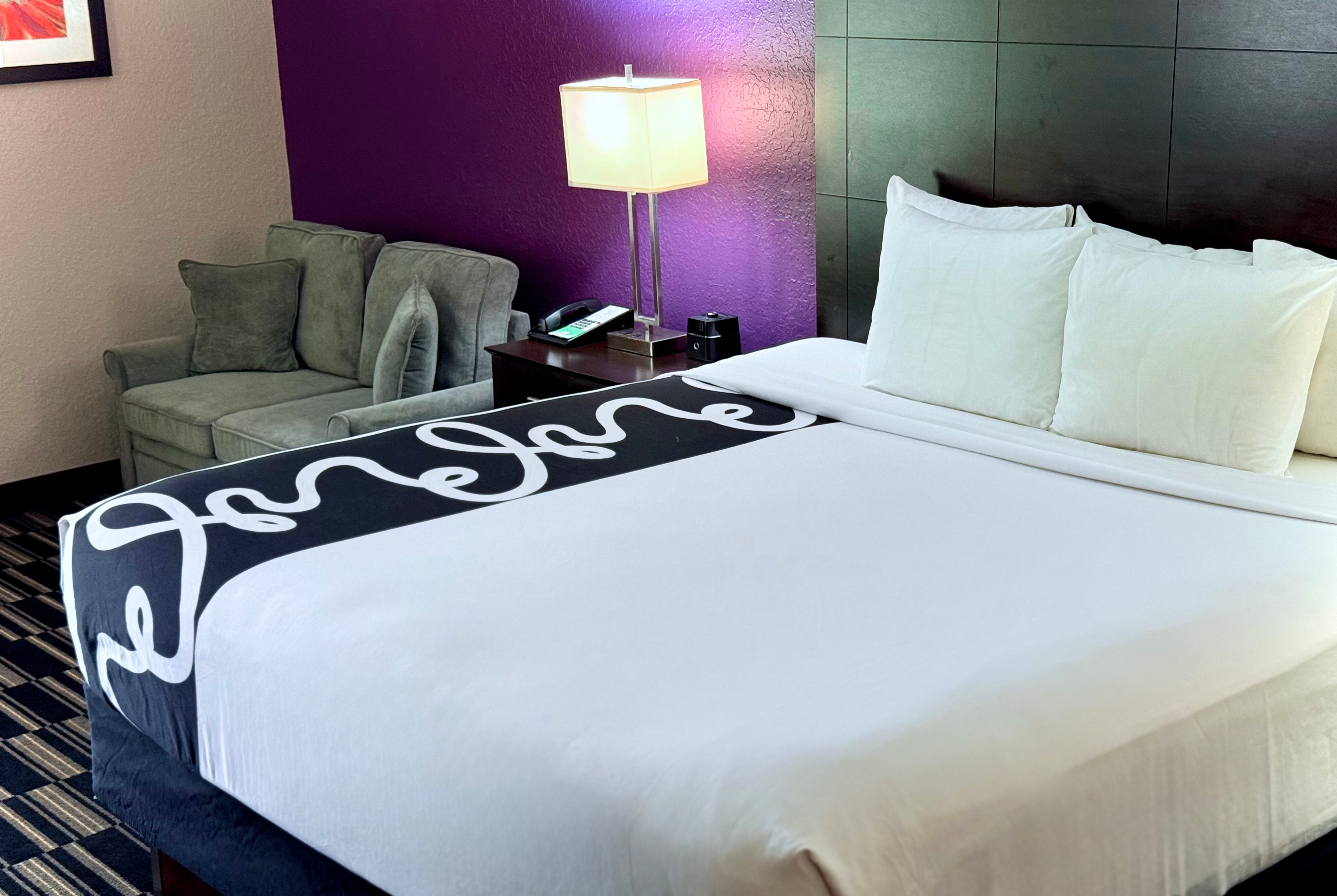 Guest room at the La Quinta Inn & Suites by Wyndham Orlando Universal area in Orlando, Florida