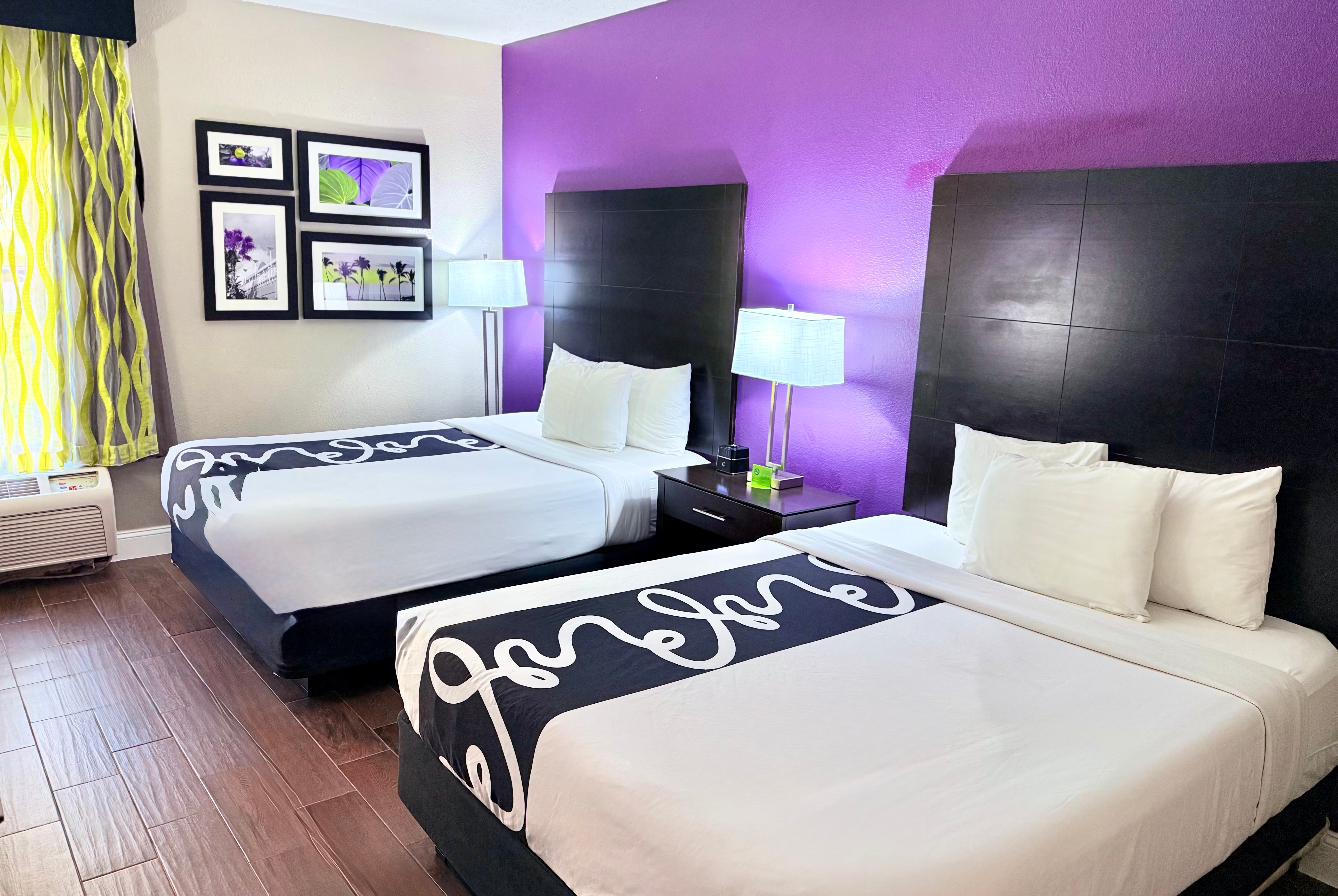 Guest room at the La Quinta Inn & Suites by Wyndham Orlando Universal area in Orlando, Florida